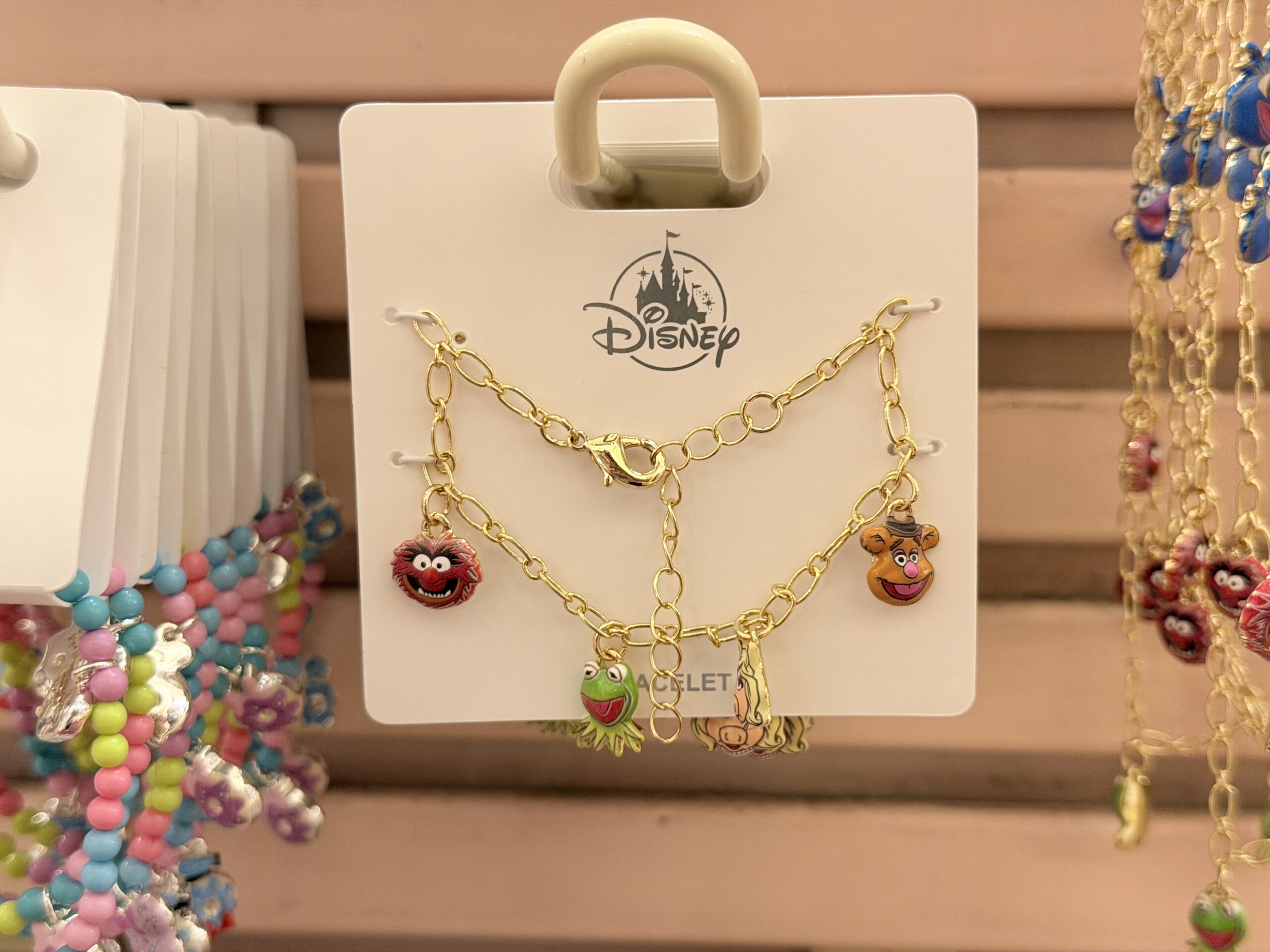 The bracelet has the same set of characters, minus Gonzo.