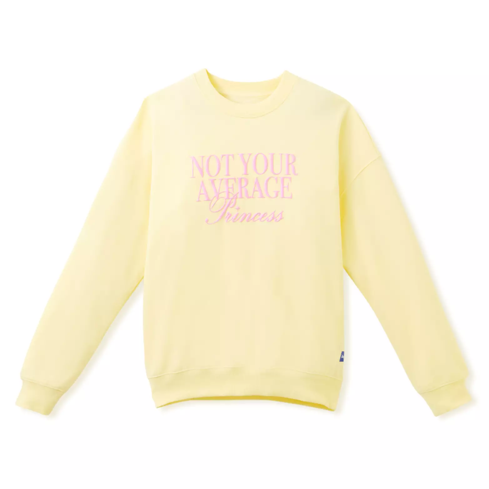 In the same shade of pastel yellow, this pullover sweatshirt reads "Not Your Average Princess" in pink on the front.