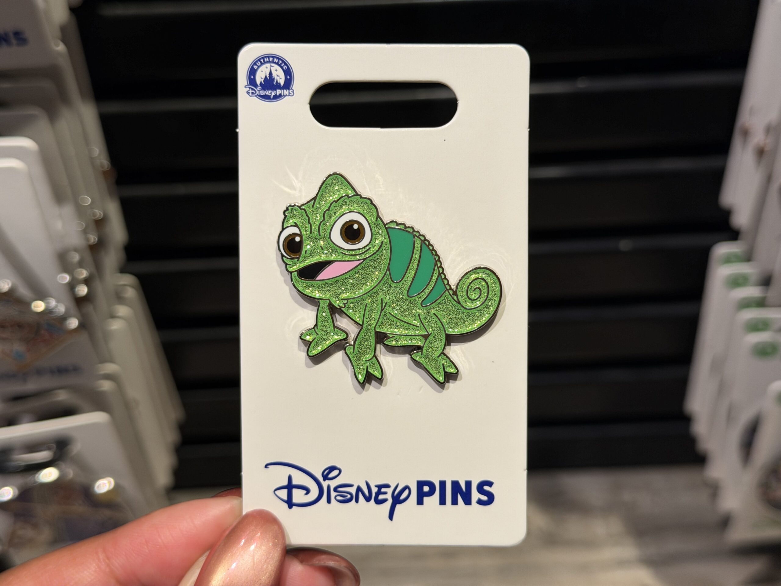 Rapunzel's best friend, Pascal, has a glittery green finish except for his eyes, mouth, and stripes.
