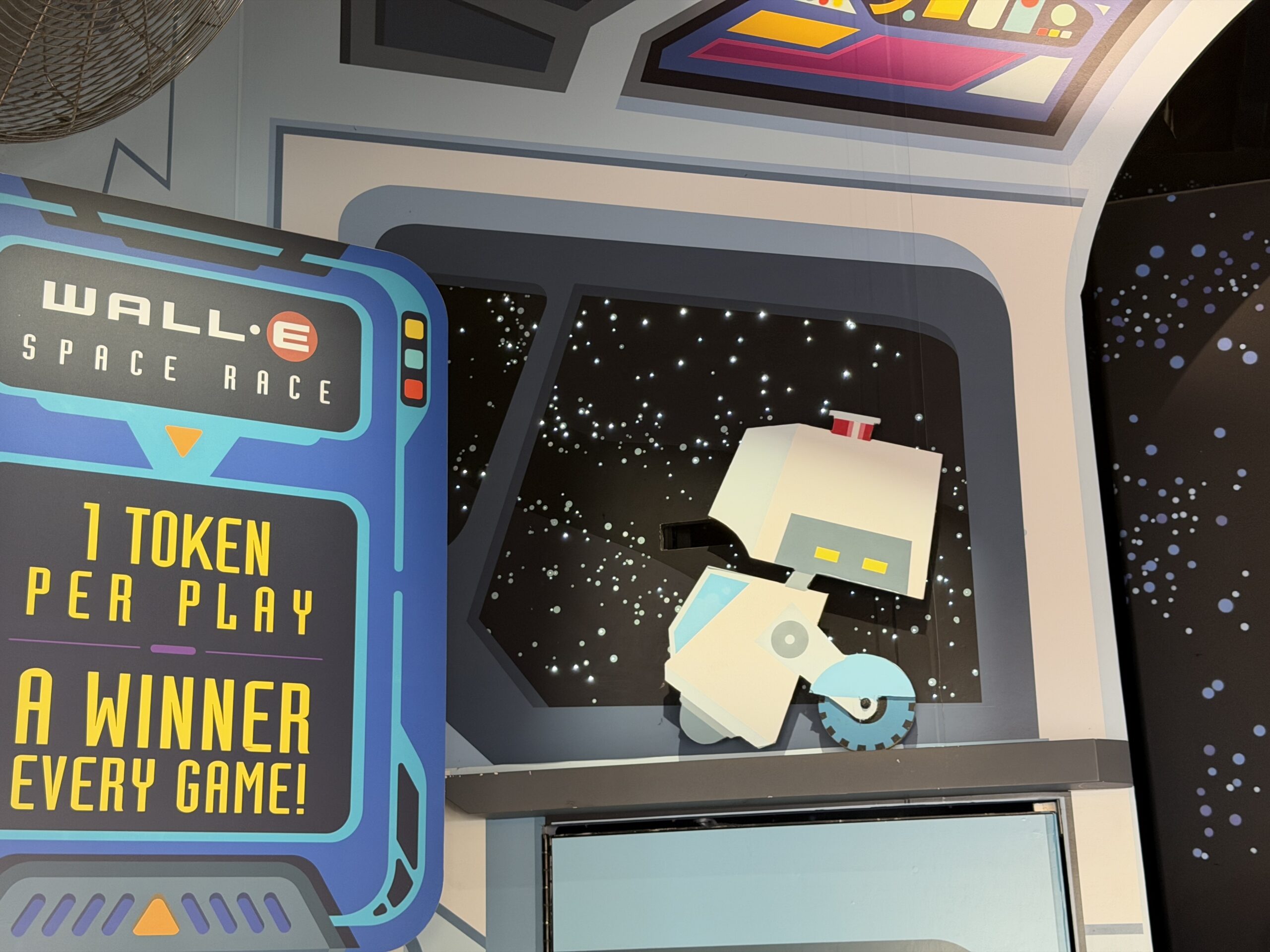 Over at the Wall-E Space Race, there are new twinkling lights that appear behind Mo the cleaning robot.