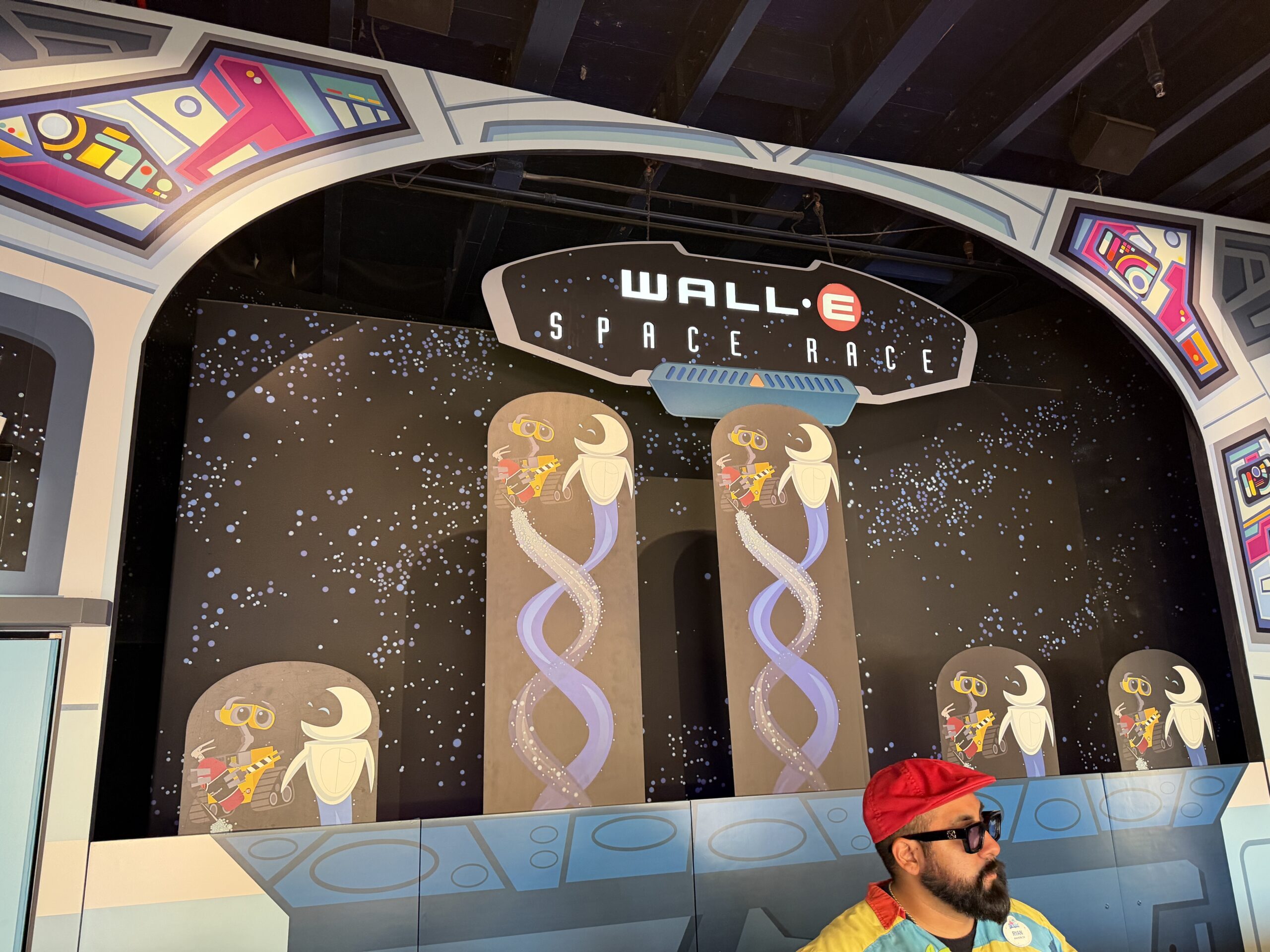 The back panel and the Wall-E and Eve panels have also been replaced at the game. Colored lights have also been replaced under the game's seating area.