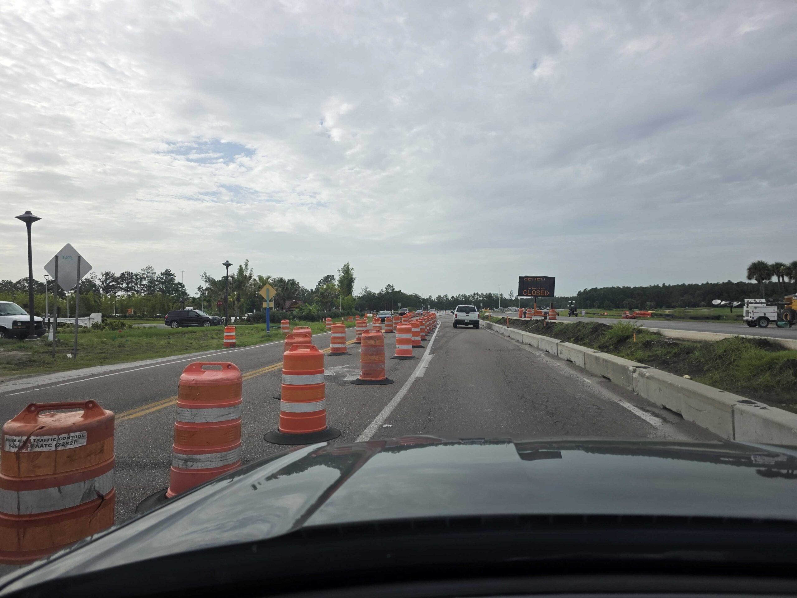 As shown above, roadwork has begun, and the intersection at Seven Seas Drive and Floridian Way is now closed. Barriers are in place along the road to prevent vehicles from accessing the area.
