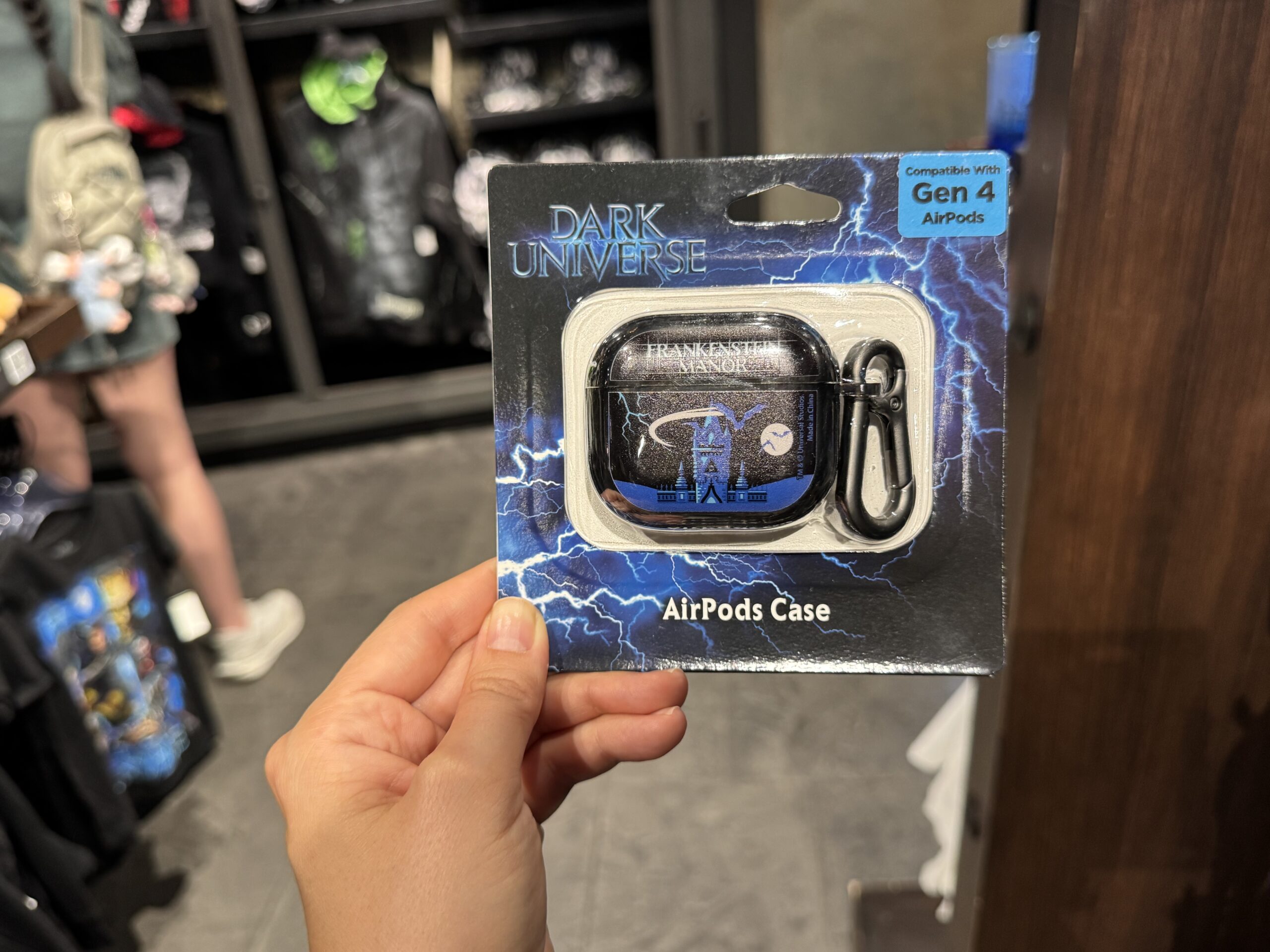 There are multiple versions of the AirPods case for Gen 1 and 2 AirPods Pro and Gen 4 AirPods. All three styles feature the towers of Frankenstein Manor in blue with bats flying across the sky and moon. "Frankenstein Manor" is in white on the lid.
