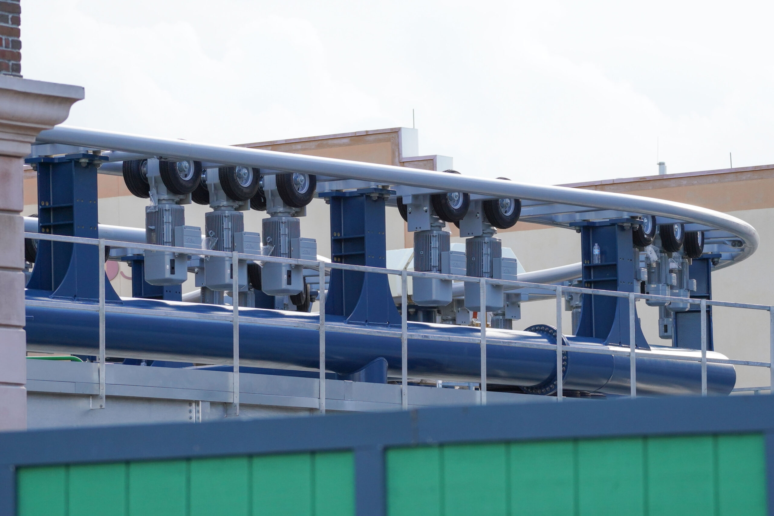After railings were added near the load station, wheels have been added to the track's motors. These will propel the cars forward.