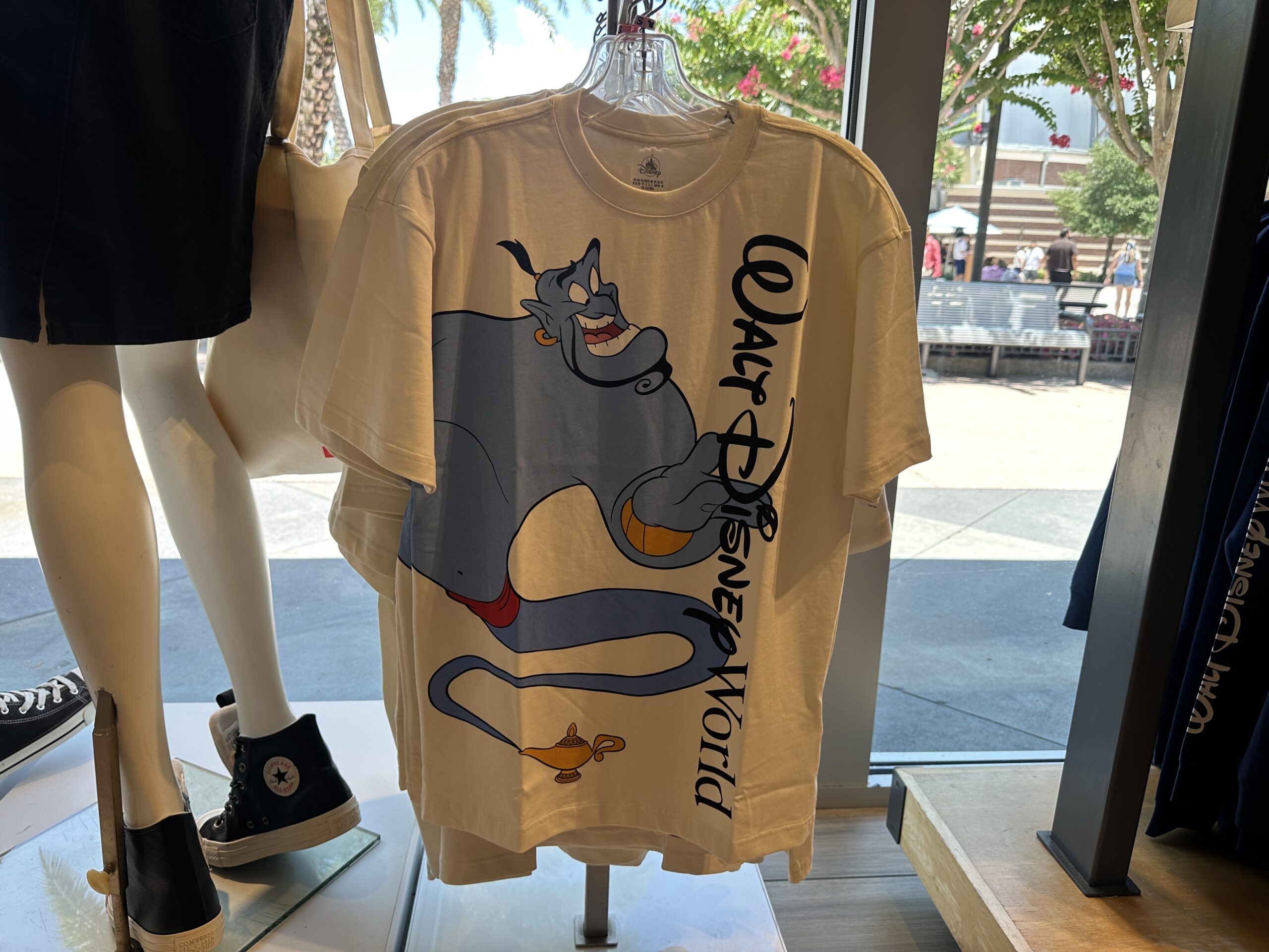 Genie is pictured on this white short-sleeved tee with the Walt Disney World wordmark in black.