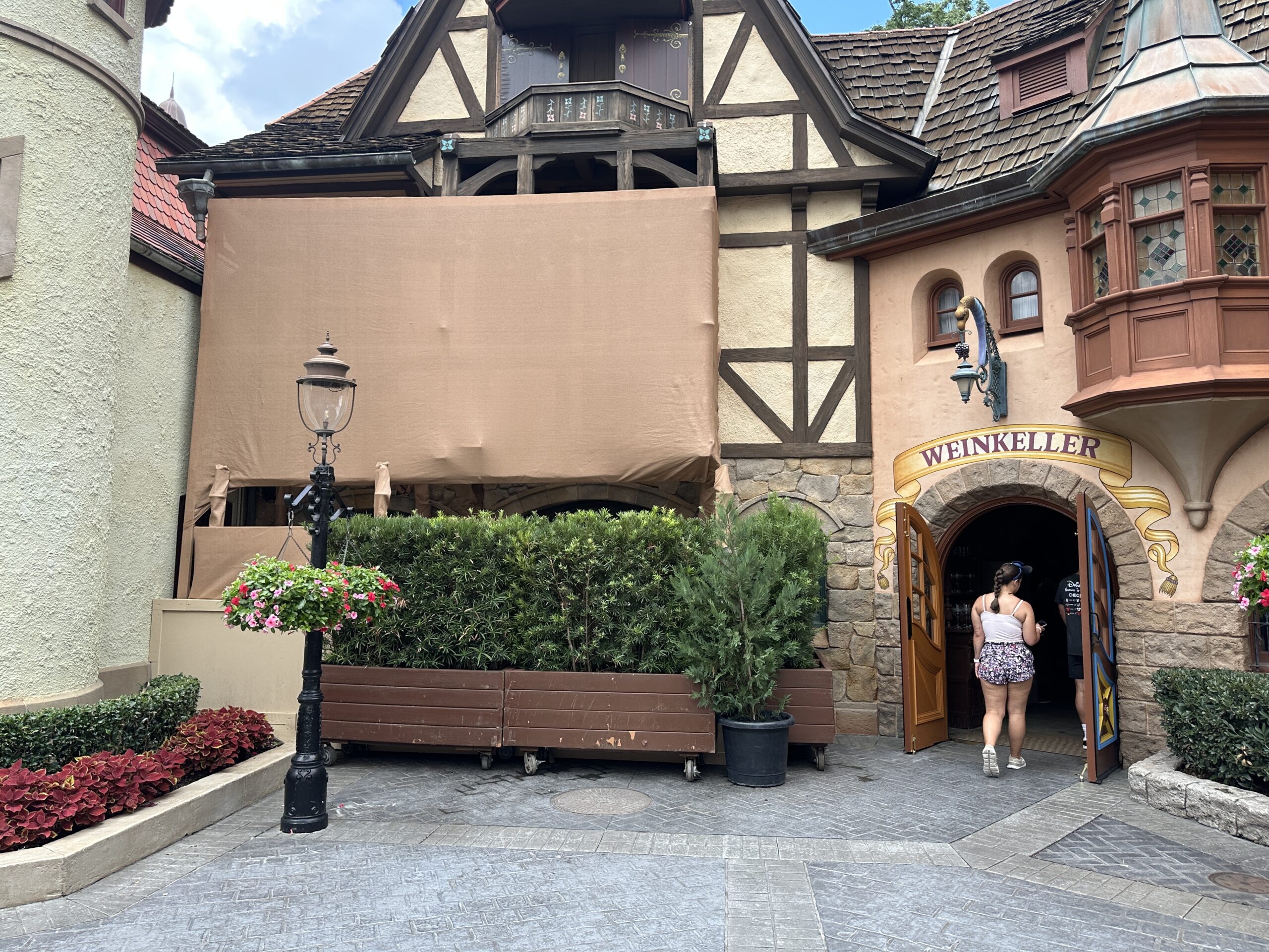 Disney continues to prepare for an exterior refurbishment of Stein Haus in the Germany Pavilion of EPCOT. More scrim and scaffolding have been installed outside.