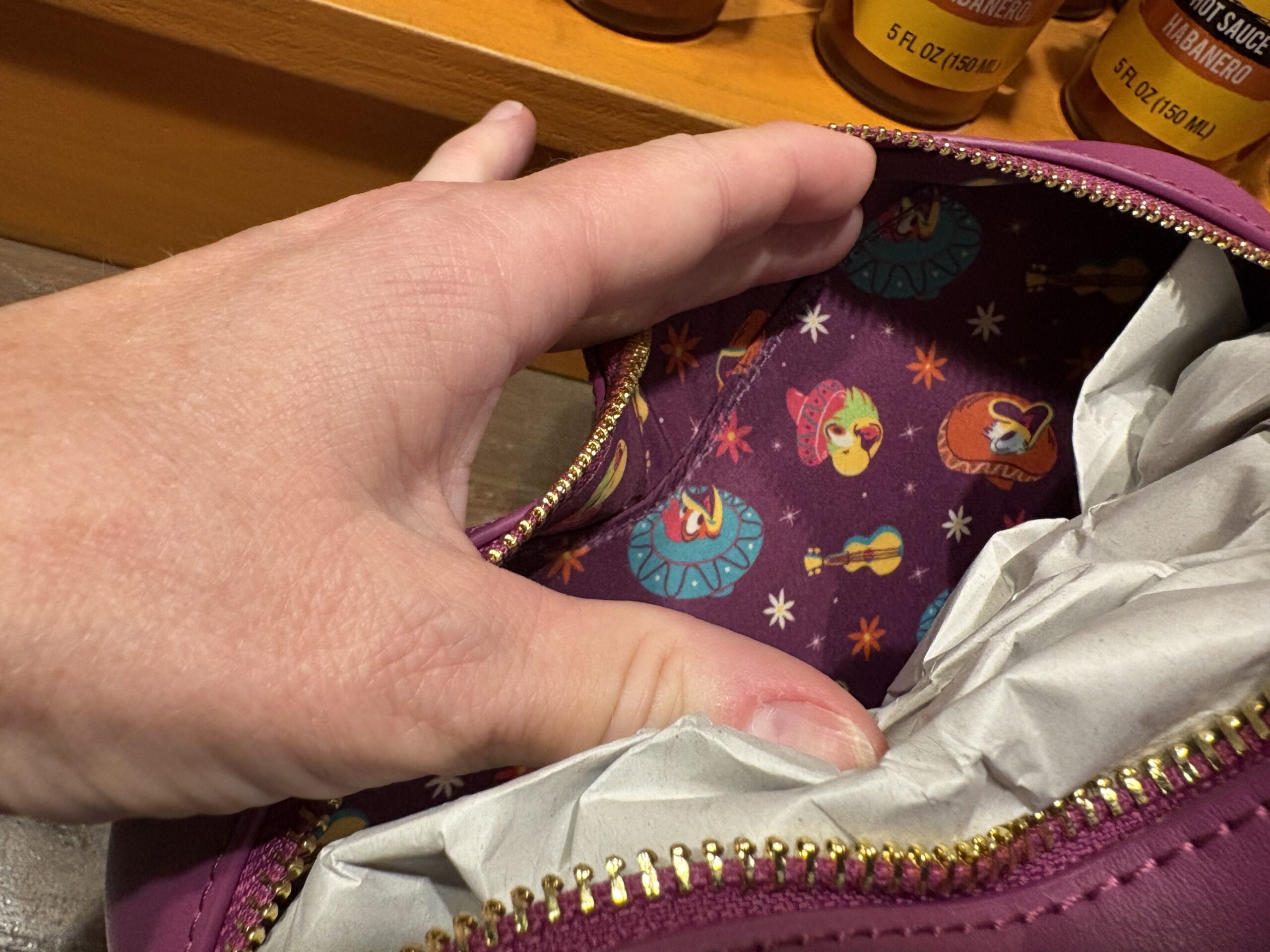 A guitar-shaped Loungefly crossbody bag featuring the Three Caballeros has arrived at EPCOT. We spotted it in Plaza de Los Amigos in the Mexico pavilion.