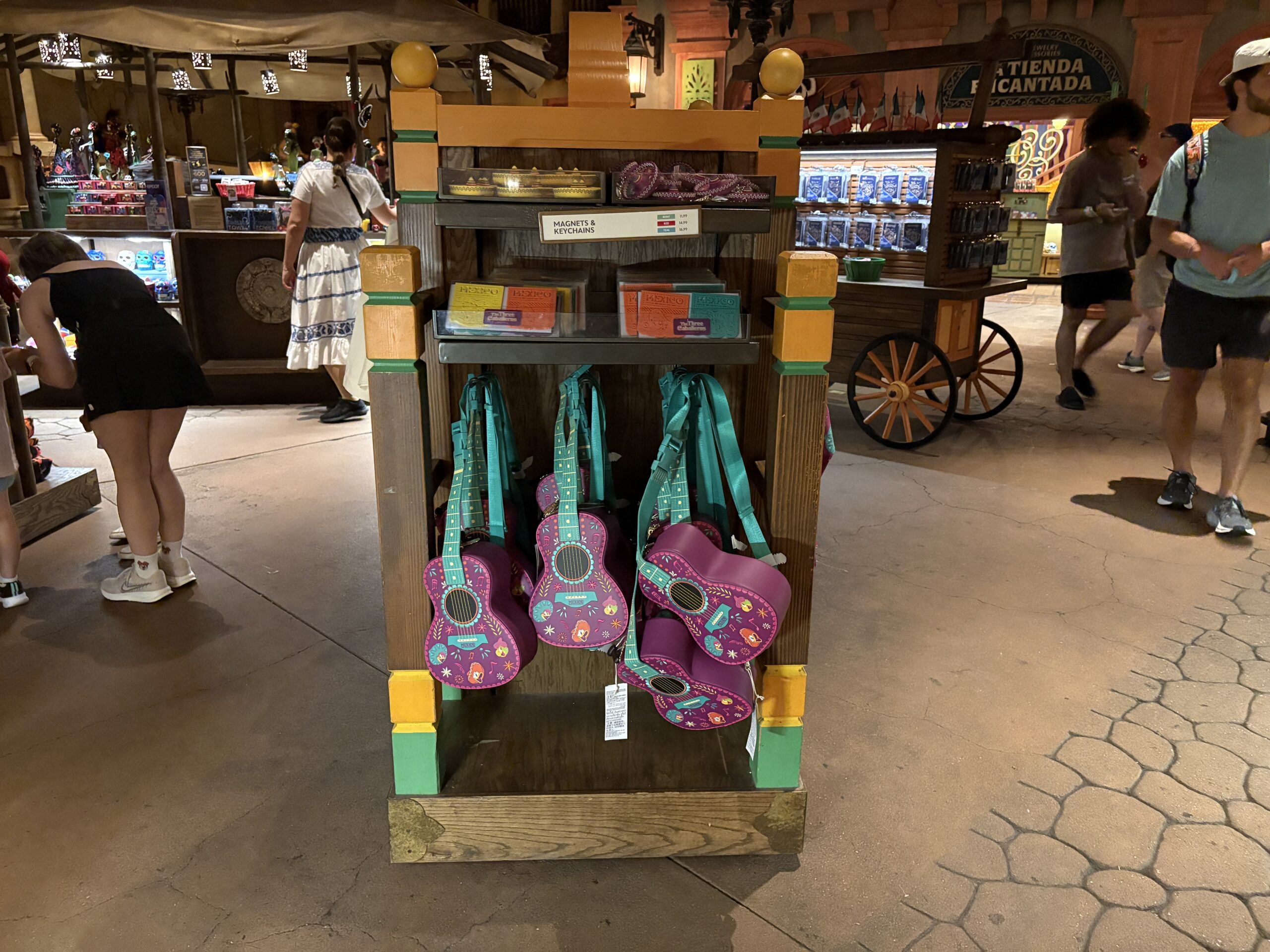 A guitar-shaped Loungefly crossbody bag featuring the Three Caballeros has arrived at EPCOT. We spotted it in Plaza de Los Amigos in the Mexico pavilion.
