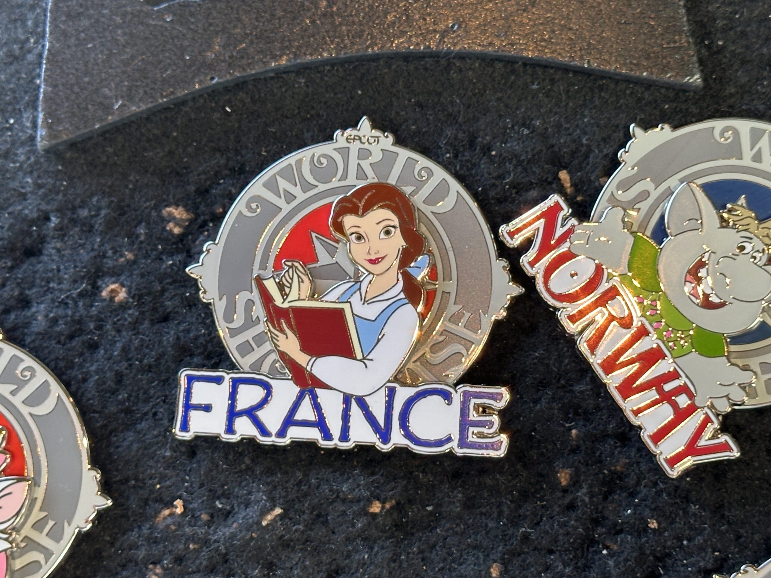 Belle is pictured in her village dress with a book.