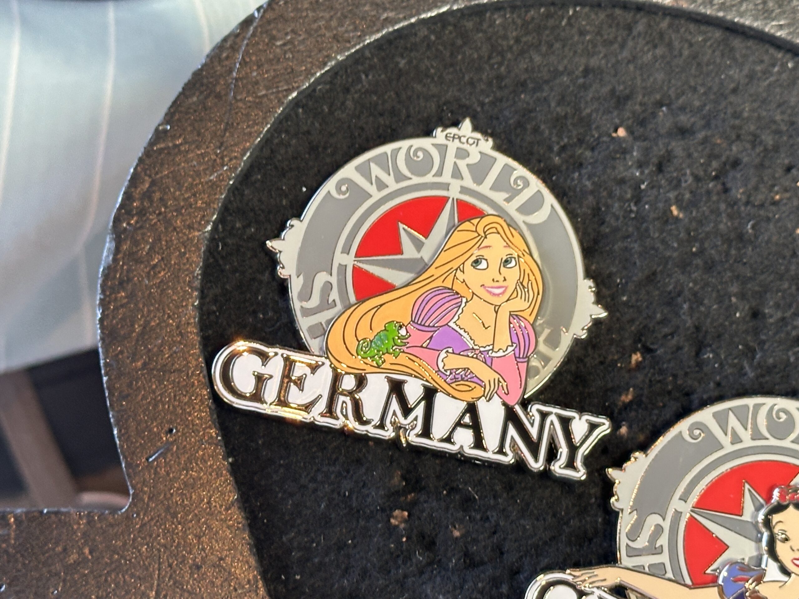 Rapunzel and Pascal are pictured on this Germany pin.