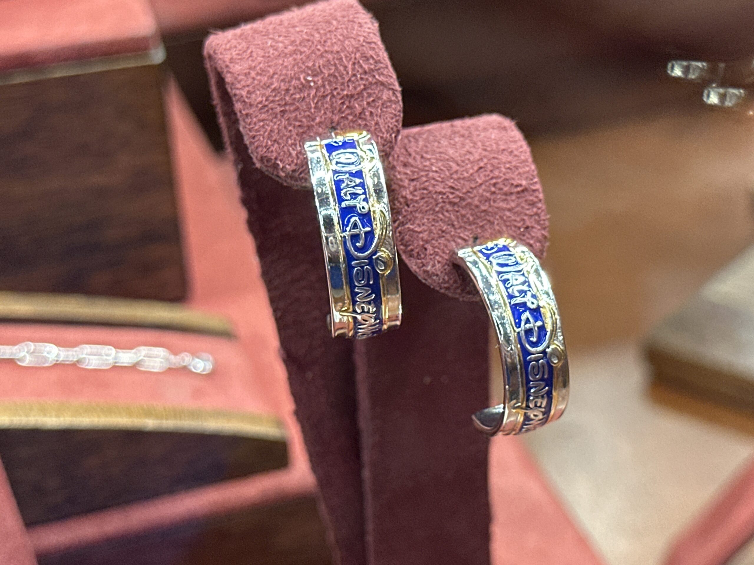 Disney World marquee earrings and a rainbow necklace by CRISLU have arrived at Magic Kingdom.