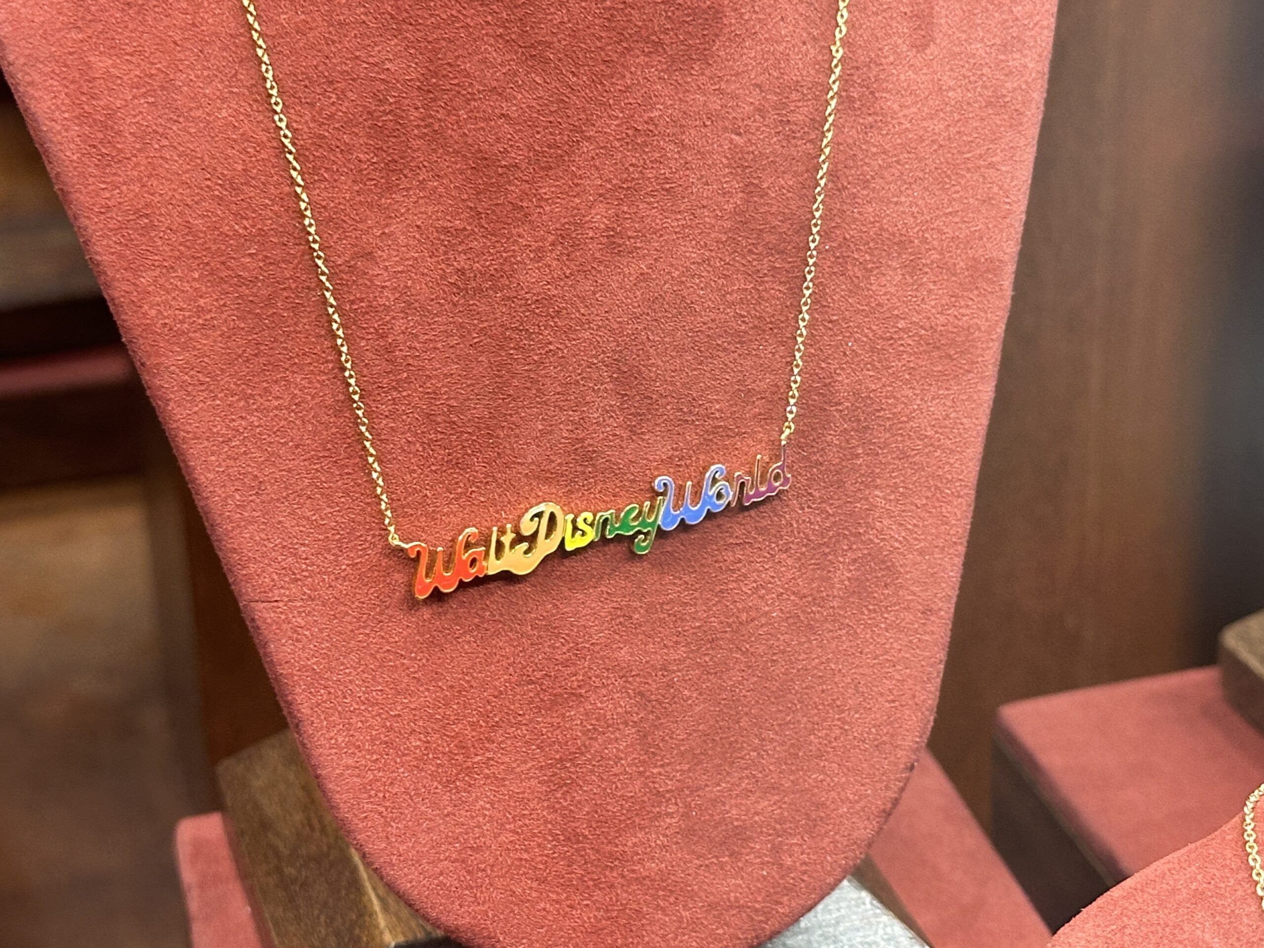 Disney World marquee earrings and a rainbow necklace by CRISLU have arrived at Magic Kingdom.