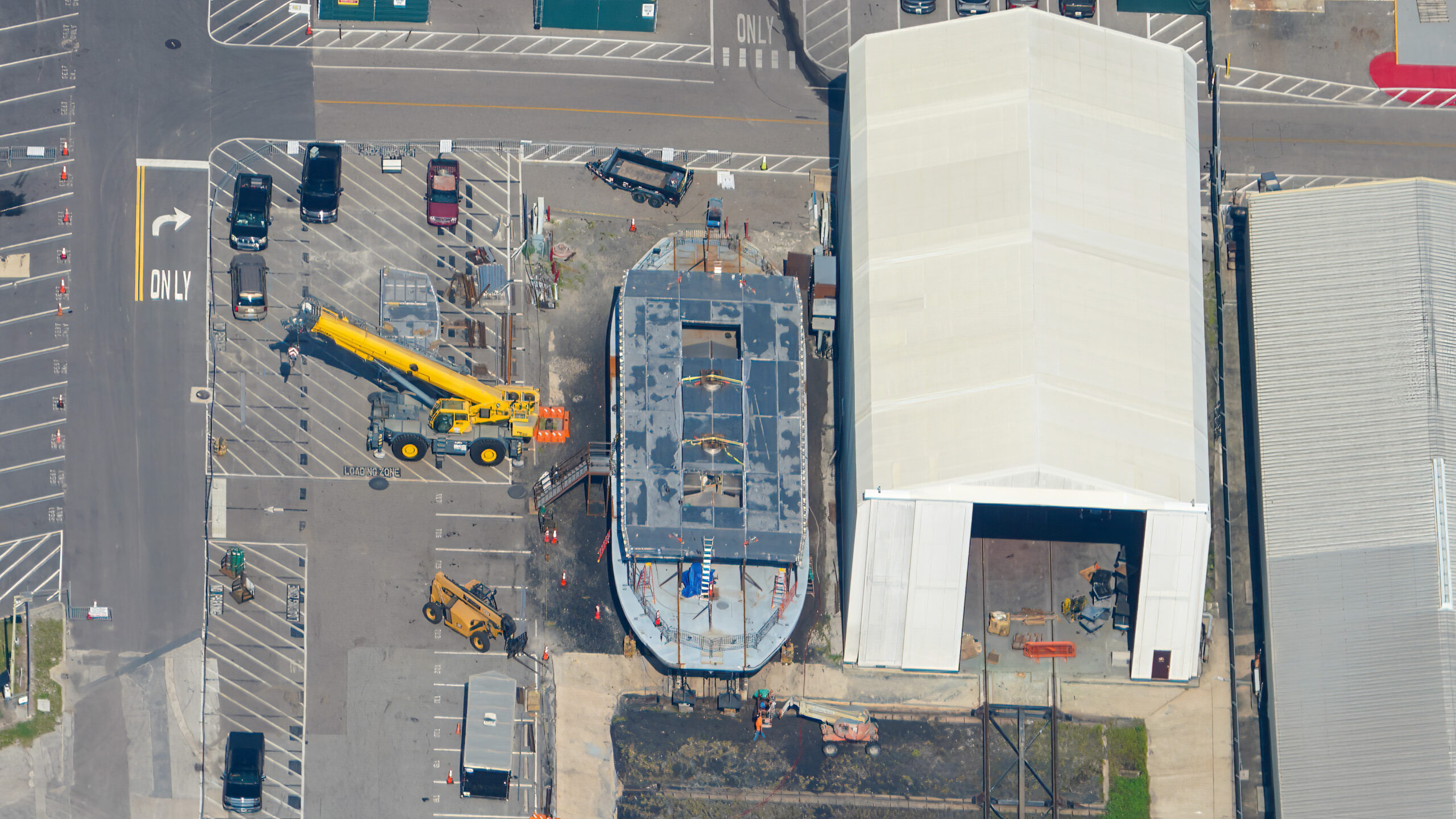 The fourth Magic Kingdom ferry, called The Meg Gilbert Crofton, is under construction, and the top deck has been added to the existing hull and first deck.