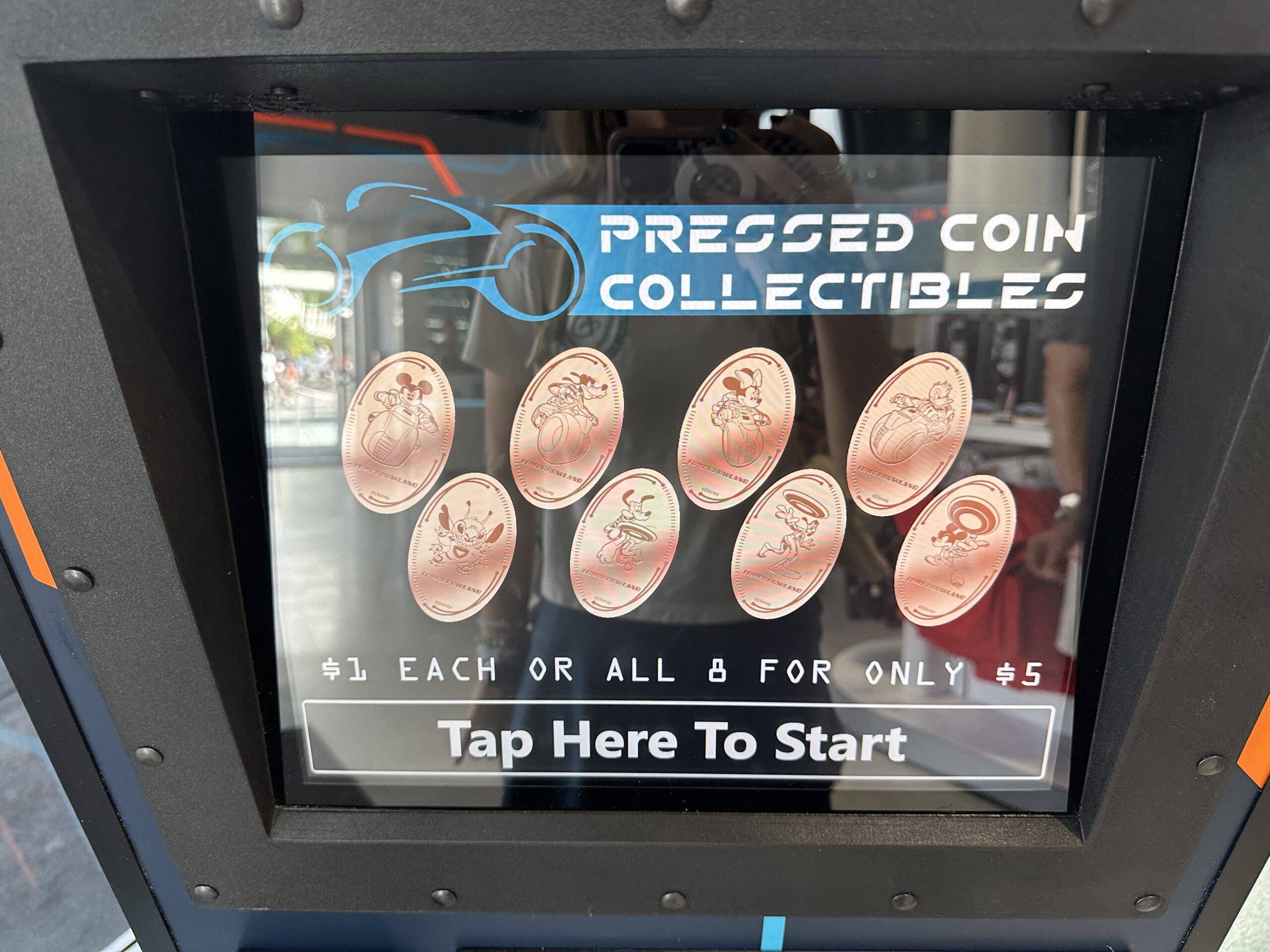 Similarly, the pennies are also themed to the ride. Four feature characters riding Lightcycles (Mickey, Goofy, Minnie, and Donald) while the others show characters in Tron outfits playing with discs (Pluto, Goofy, and Mickey), and there is one of just Stitch in a Tron outfit.