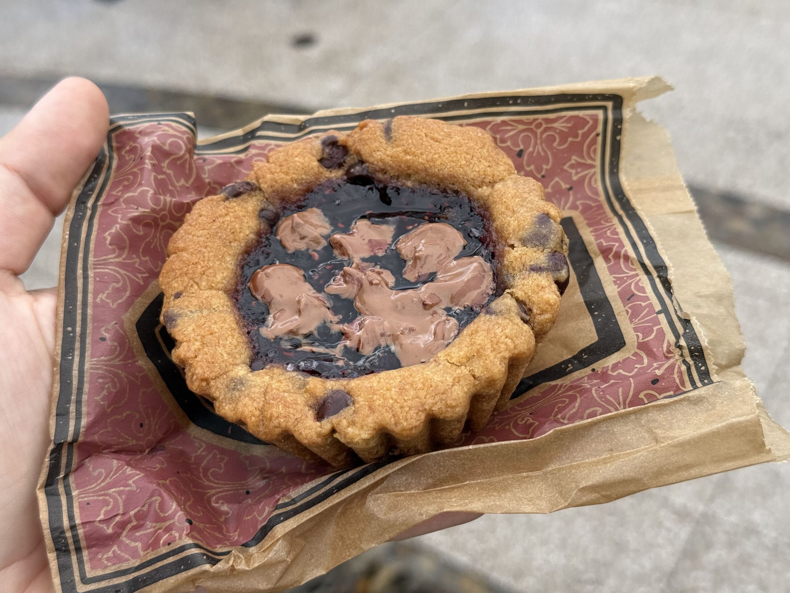 A Gideon’s Chocolate Chip Tart filled with Rich Chocolate Fudge and topped with a freshly made Raspberry Jam.