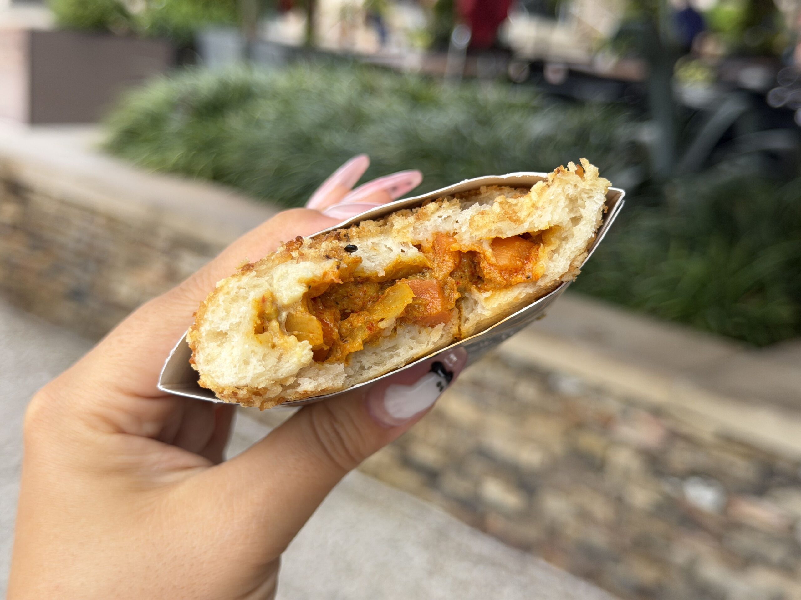 Mildly Spicy Chicken with Potato & Carrot Coconut Curry, in a Fried Garlic covered Coffyn harmonizing to create this flavorful offering. Pairing: Red Panda's Dipping Sauce