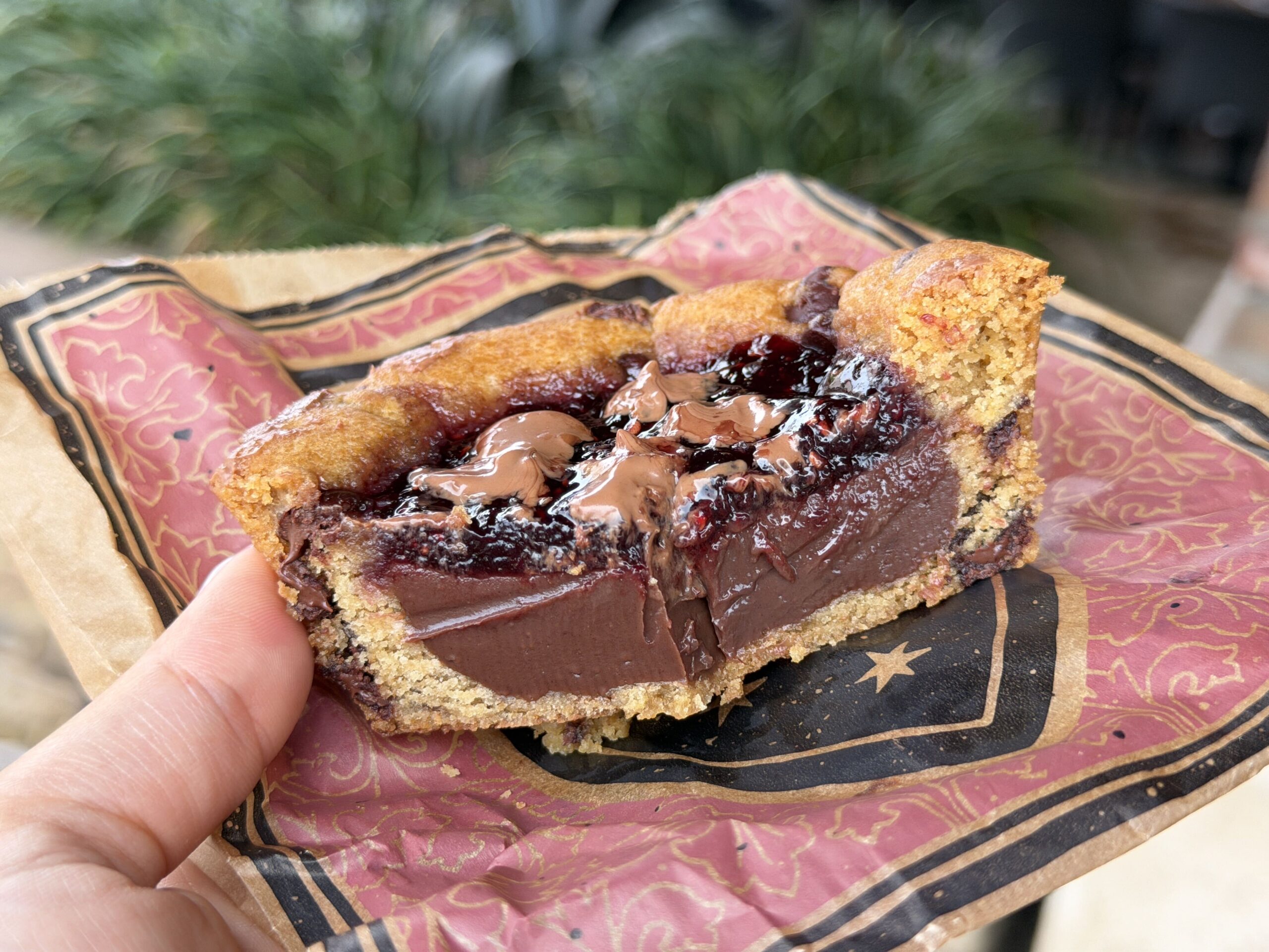 A Gideon’s Chocolate Chip Tart filled with Rich Chocolate Fudge and topped with a freshly made Raspberry Jam.