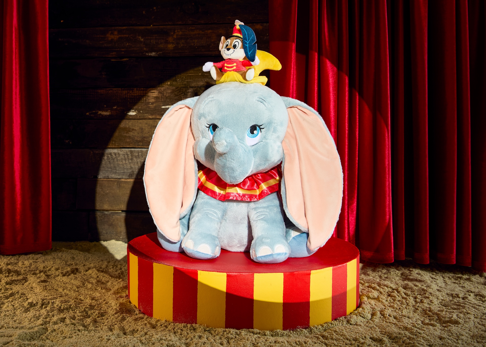 The Dumbo and Timothy Mouse Plush is a great gift as baby’s first toy or would look terrific tucked onto your shelves as part of a plush collection. The soft, huggable friend has his signature oversized floppy ears complete with his circus clown hat and satin collar costume, featuring a tiny Timothy Mouse along for the ride.