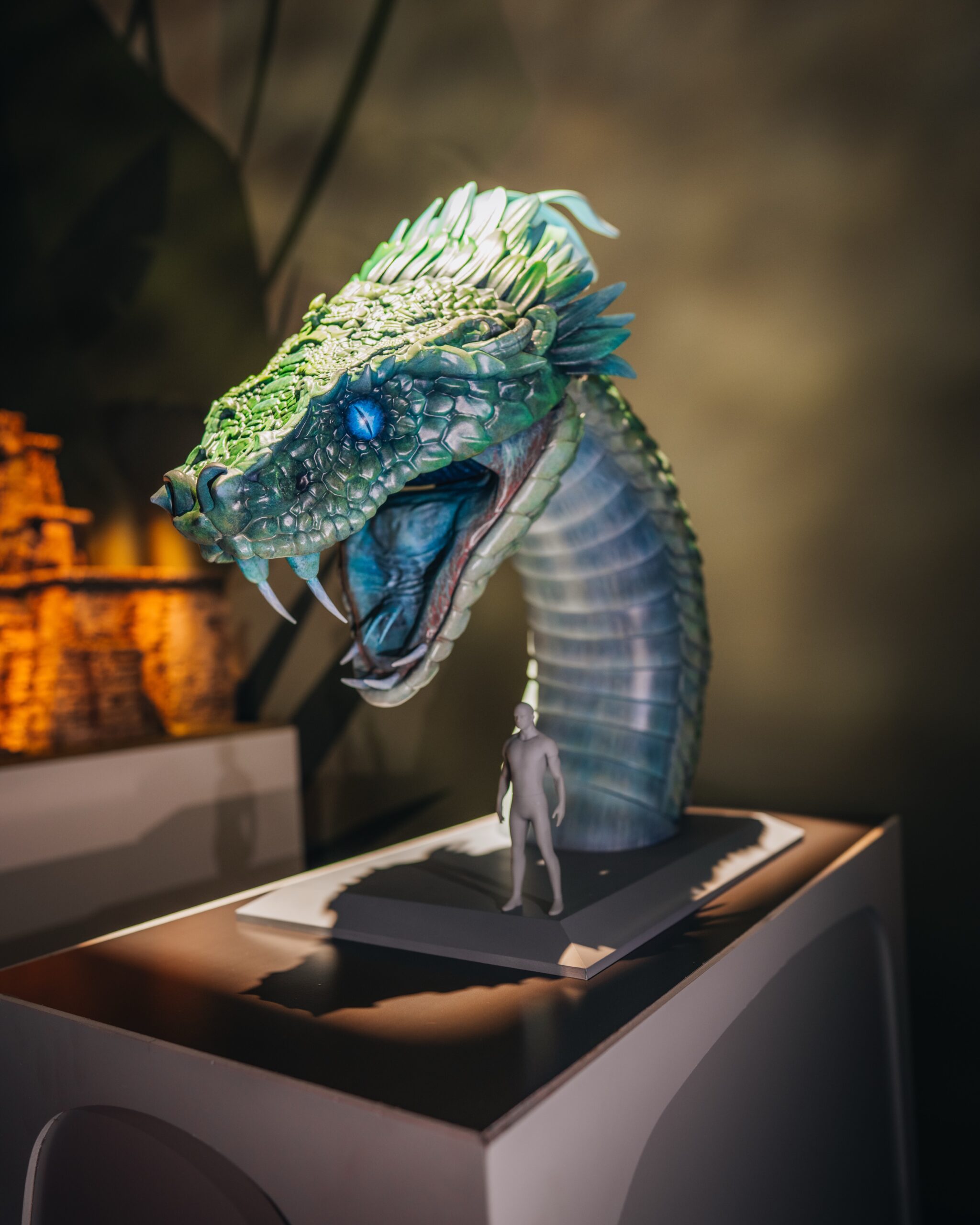 The Walt Disney Imagineering pavilion at D23 received several new exhibits overnight, giving attendees a closer look at projects announced during the Disney Experiences showcase.