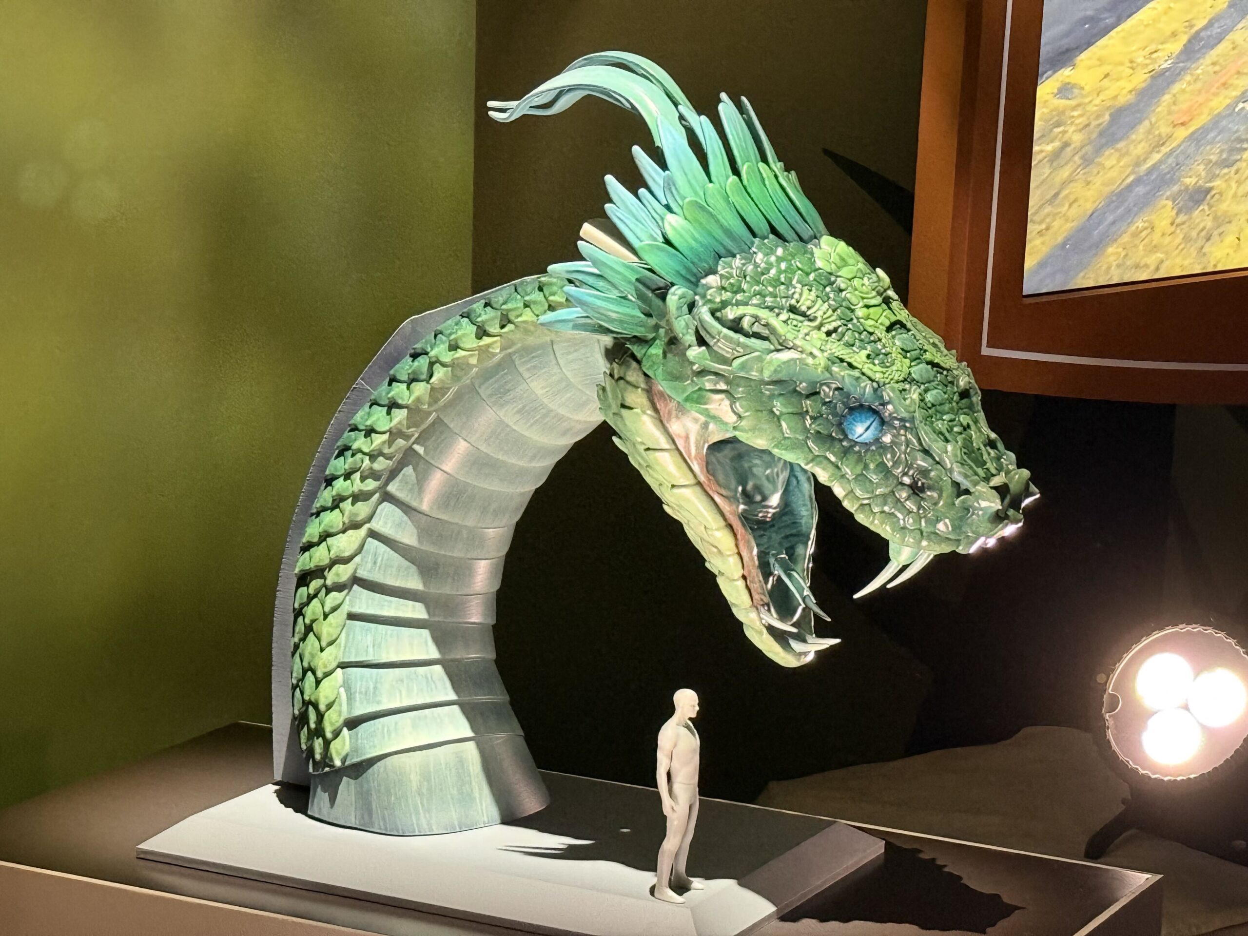 The Walt Disney Imagineering pavilion at D23 received several new exhibits overnight, giving attendees a closer look at projects announced during the Disney Experiences showcase.