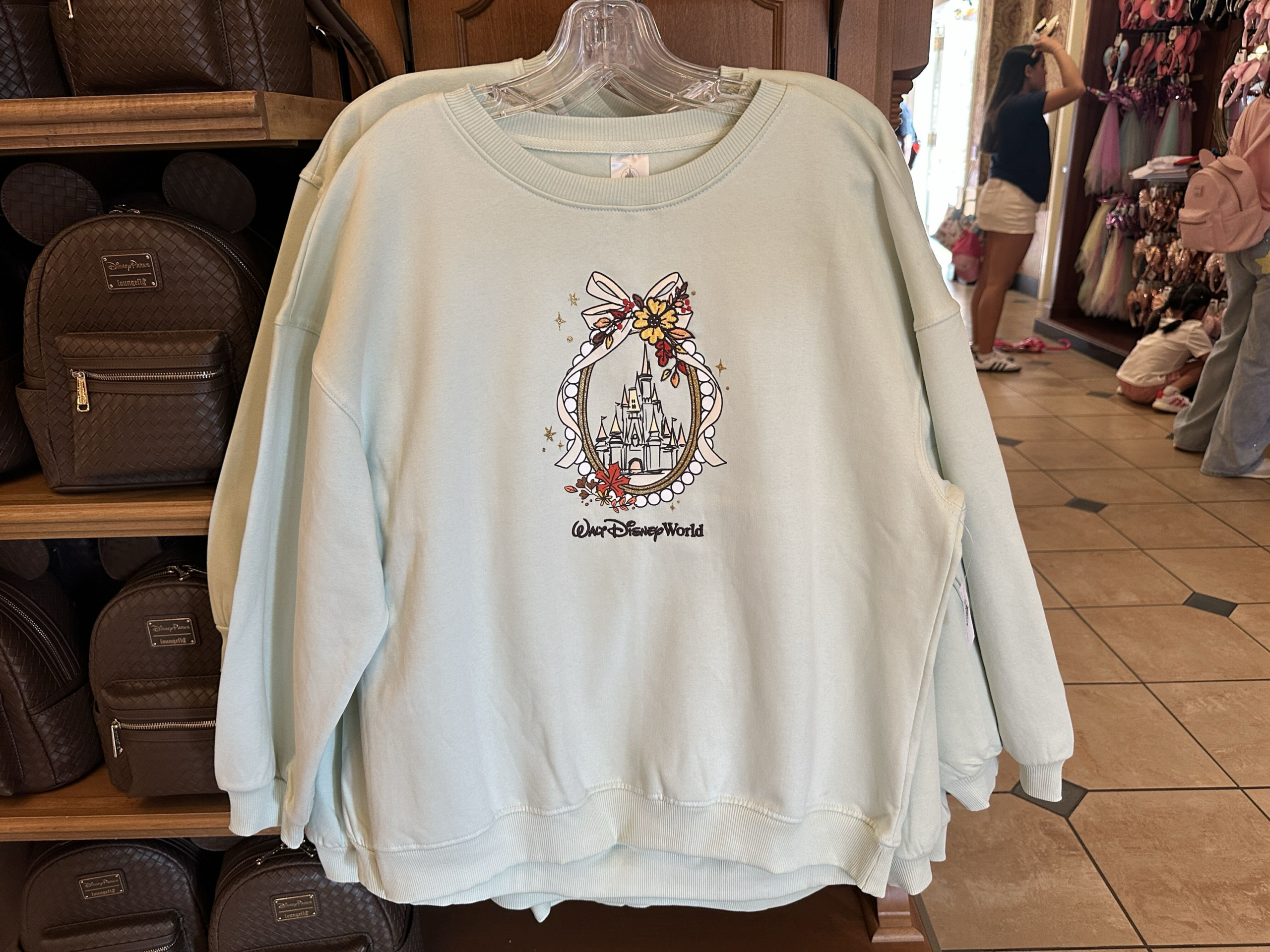 Fall-Themed Cinderella Castle Sweatshirt Comes to Magic Kingdom