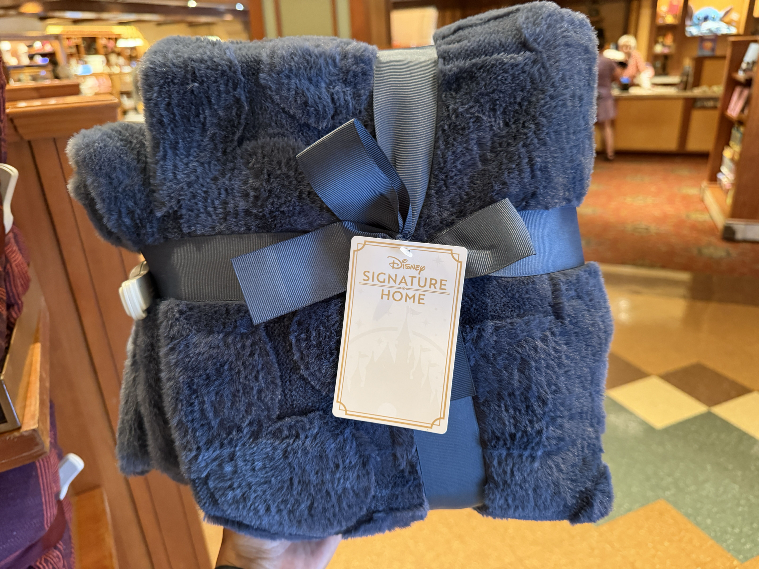New Disney Signature Home Blankets Bring Cozy Designs to Disneyland
