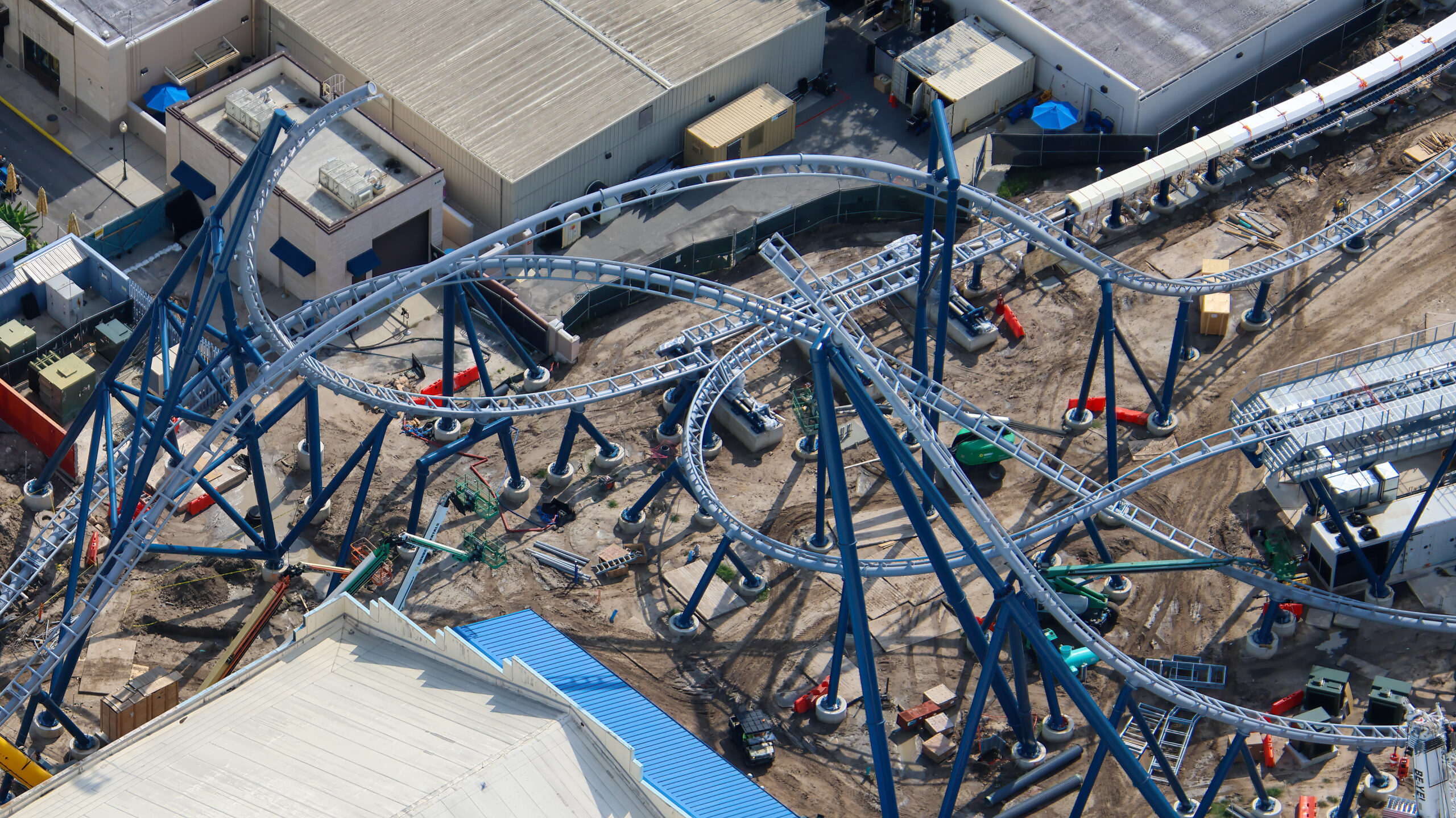 Aerial photographer bioreconstruct shared new views of the sprawling construction site, offering some of the clearest looks yet at the attraction’s interconnected track, station, launch, and maintenance areas.