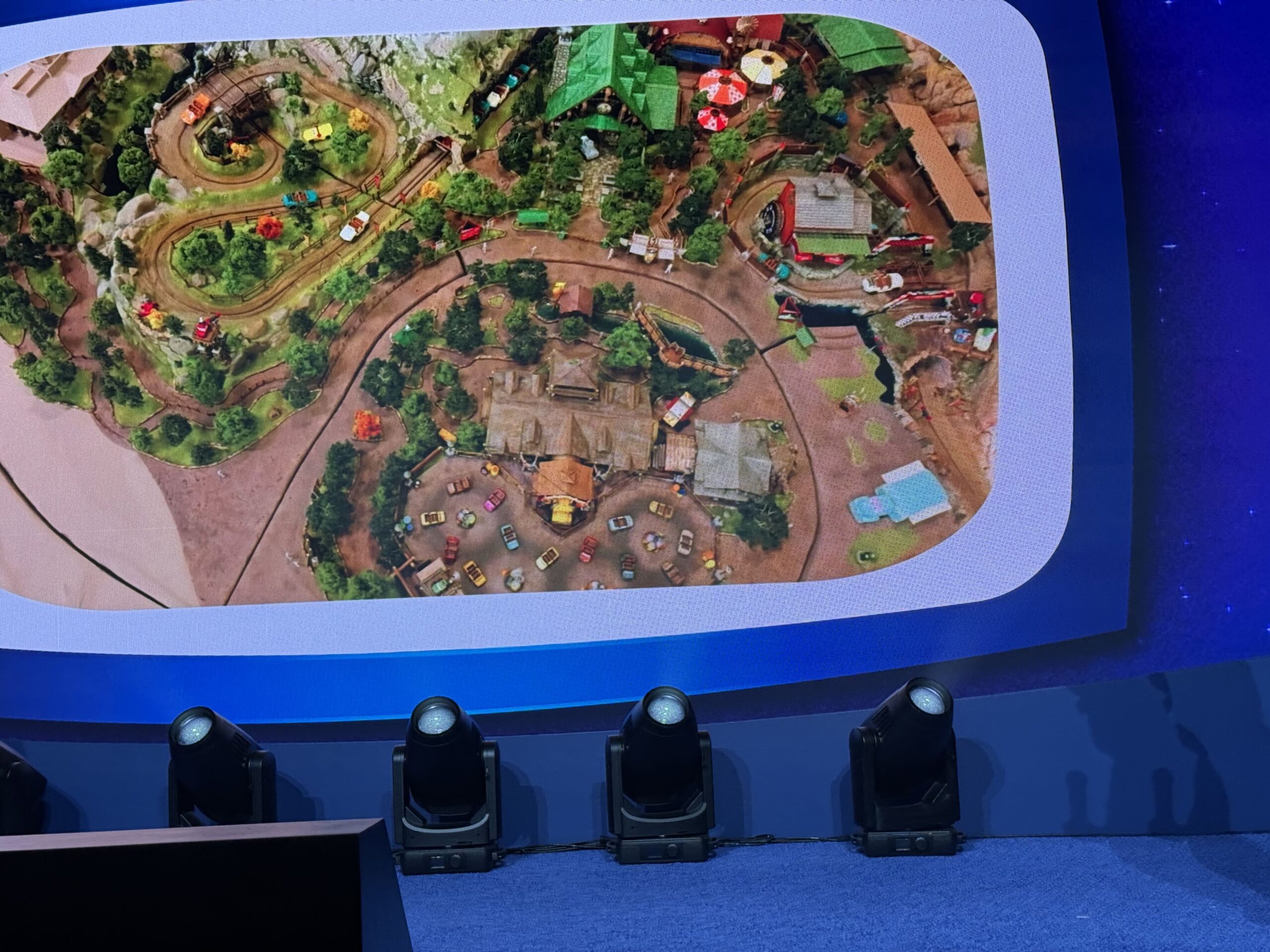 Walt Disney Imagineering shared new concept art, early production sketches, creative guidelines, and other behind-the-scenes material for Piston Peak National Park during a presentation on the D23 expo floor.