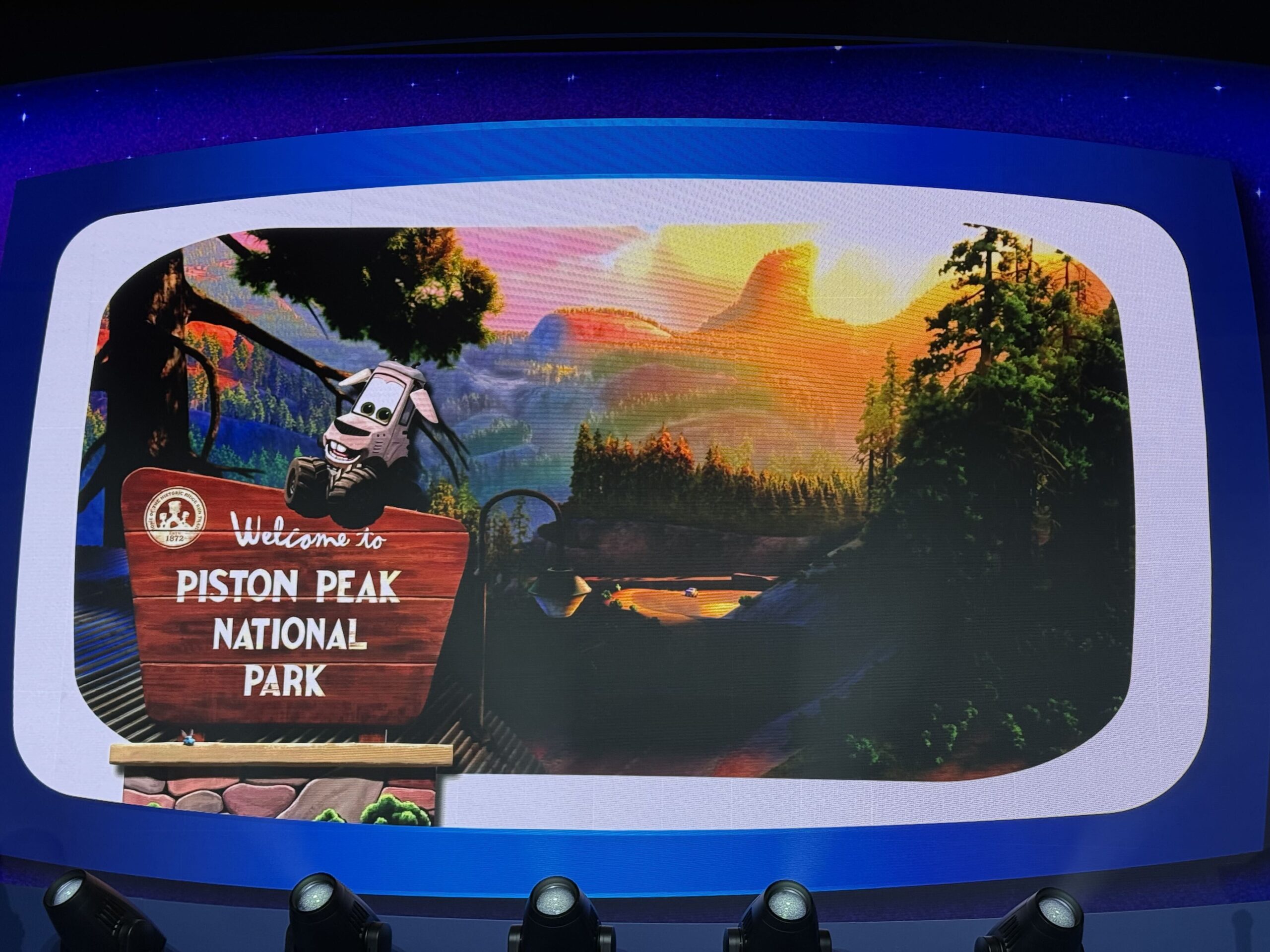 Walt Disney Imagineering shared new concept art, early production sketches, creative guidelines, and other behind-the-scenes material for Piston Peak National Park during a presentation on the D23 expo floor.