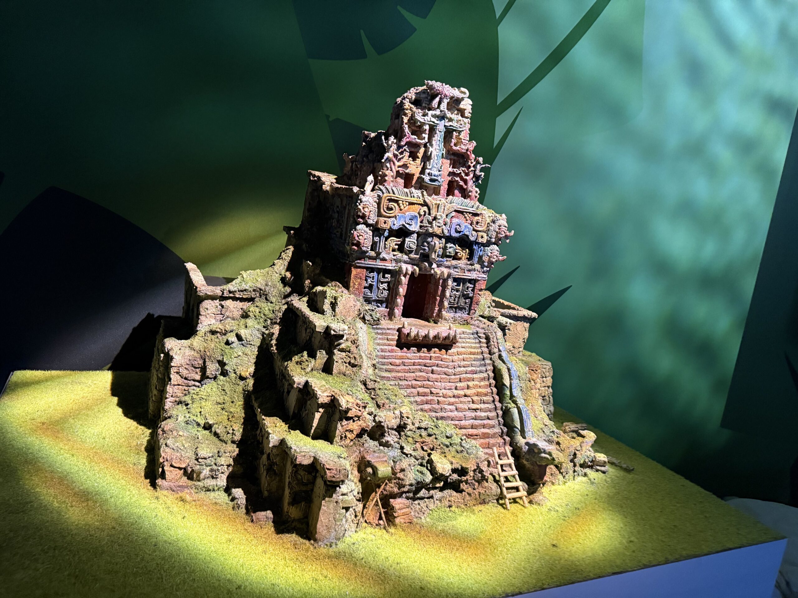 Displayed at D23: The Ultimate Disney Fan Event is a model of the new Indiana Jones ride's temple facade, as well as photos of the facade under construction and a look inside the attraction. The new ride is a reimagining of DINOSAUR at Disney's Animal Kingdom.