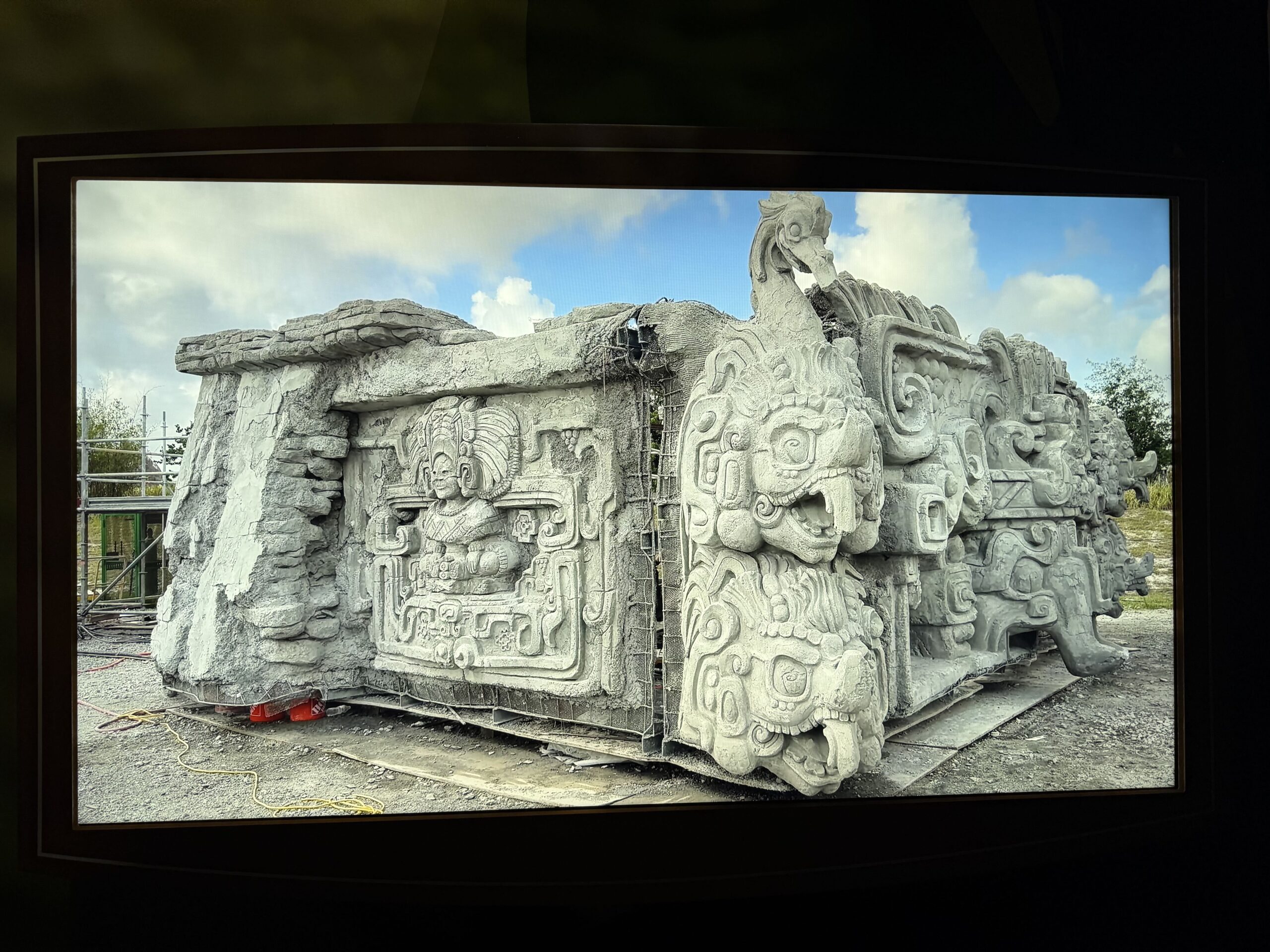 Displayed at D23: The Ultimate Disney Fan Event is a model of the new Indiana Jones ride's temple facade, as well as photos of the facade under construction and a look inside the attraction. The new ride is a reimagining of DINOSAUR at Disney's Animal Kingdom.