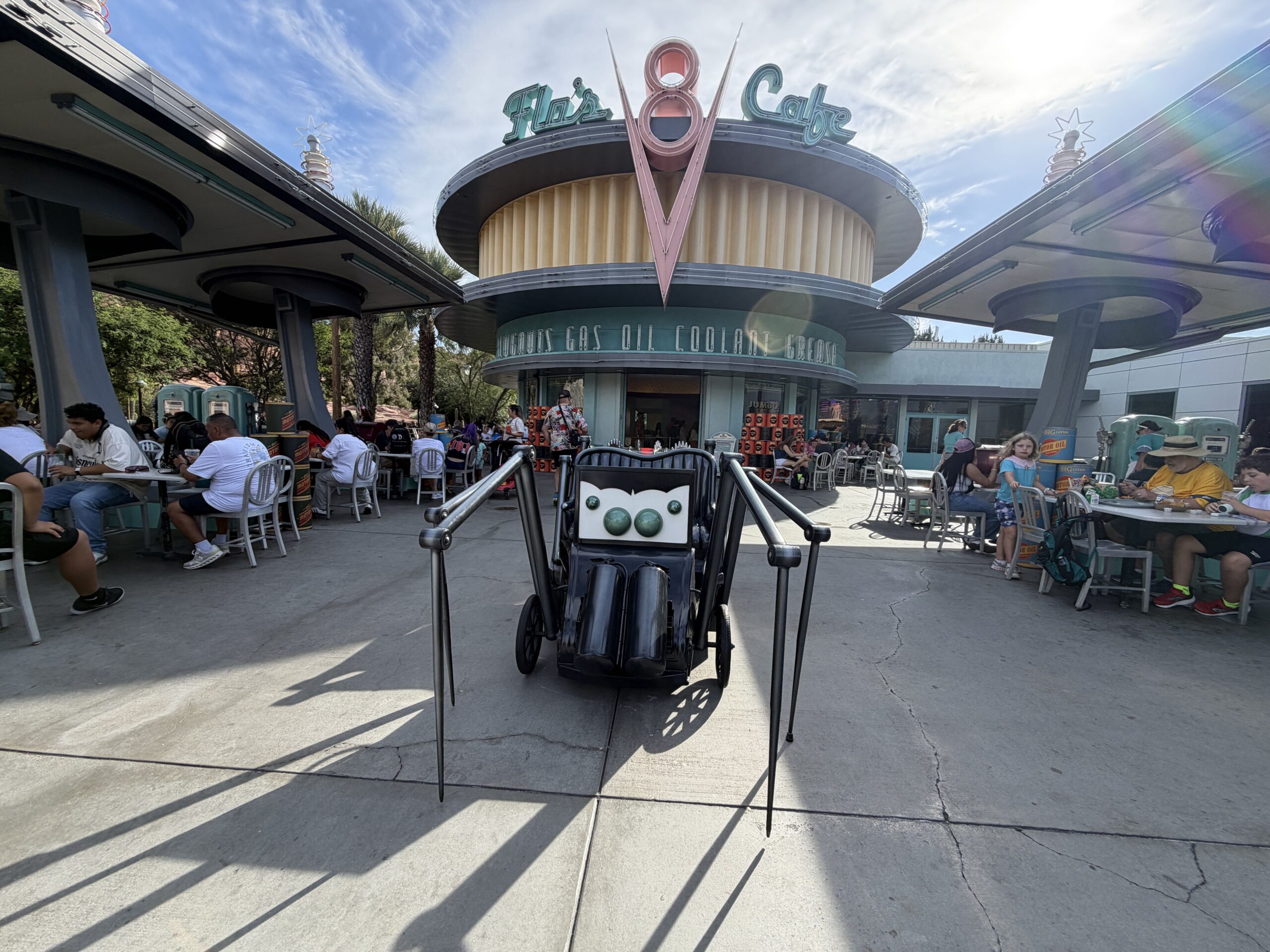 An old, spider-like jalopy waits for a bite outside of Flo's V8 Cafe.