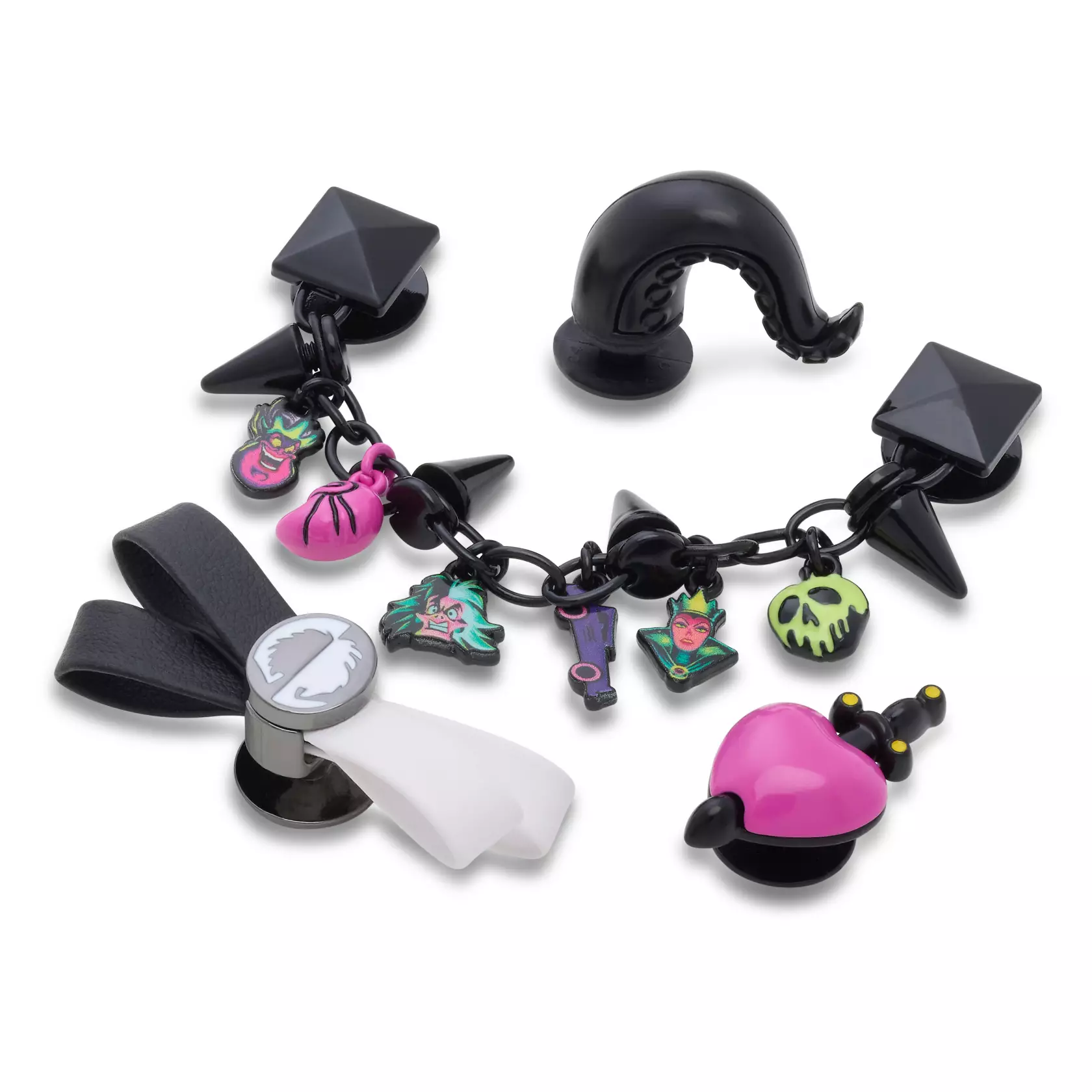 Decorate your Crocs with these four Jibbitz charms. A black chain with studs, spikes, and villain-themed charms attaches to two ventilation holes. The other charms are a black tentacle inspired by Ursula, heart and dagger based on the Evil Queen's box, and black and white bow inspired by Cruella.