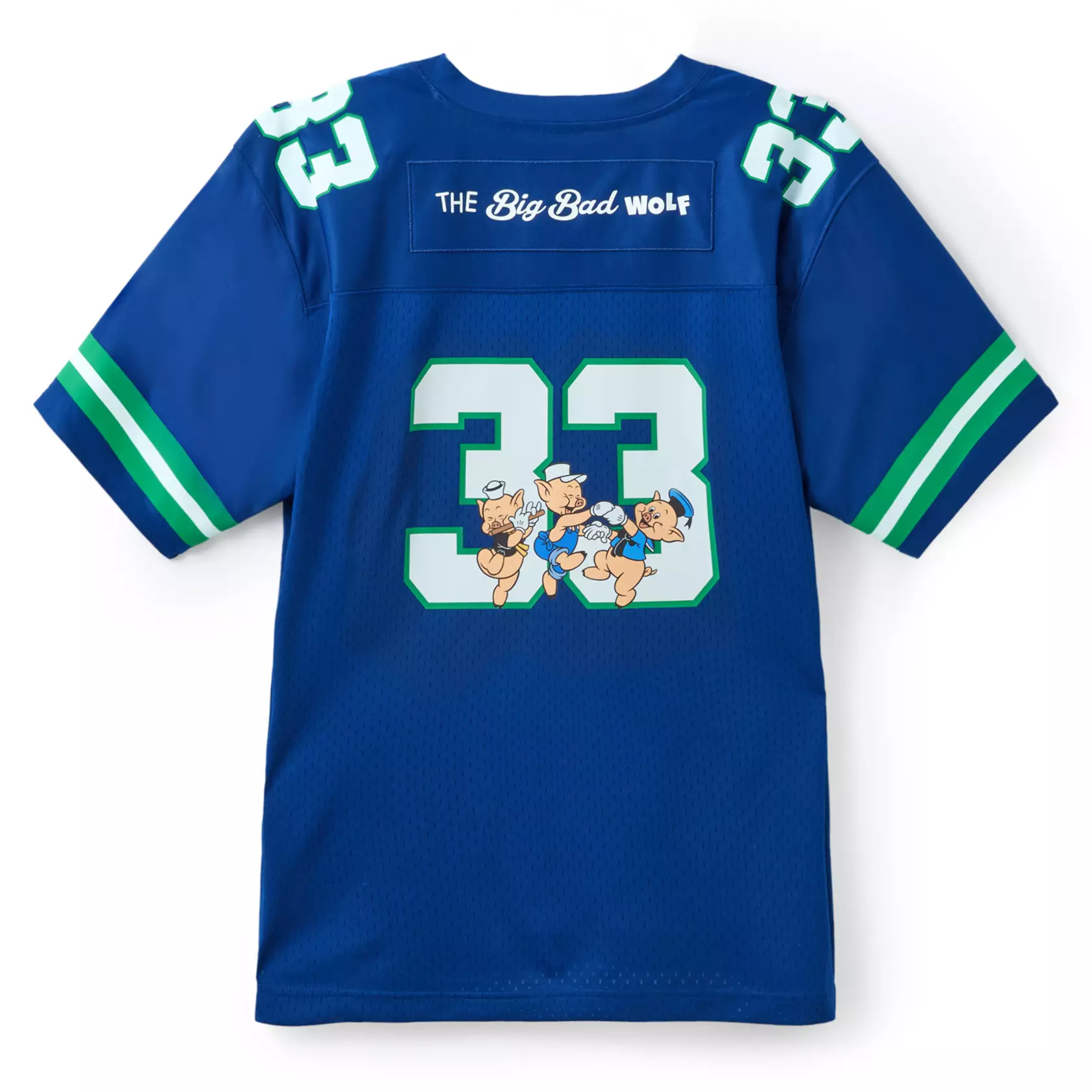 Classic villain The Big Bad Wolf from Disney's 1933 The Three Little Pigs is pictured with the number "33" on the front of this blue jersey. "The Big Bad Wolf" is above the number and across the back. The pigs are pictured on the back with the number "33," too. Green and white trim is on the sleeves. "33" is also on each shoulder.