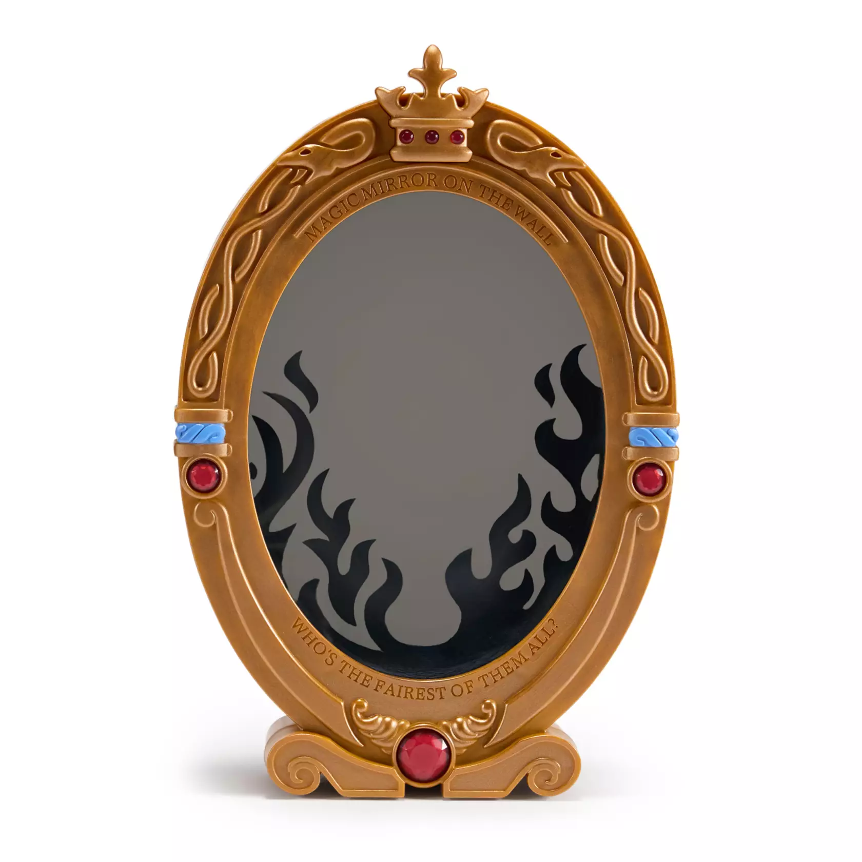 This plastic toy resembles the Magic Mirror with a sculpted 3D effect. Pressing the red jewel at the bottom of the frame activates lights and sounds. The Magic Mirror appears among light-up flames to speak to users.