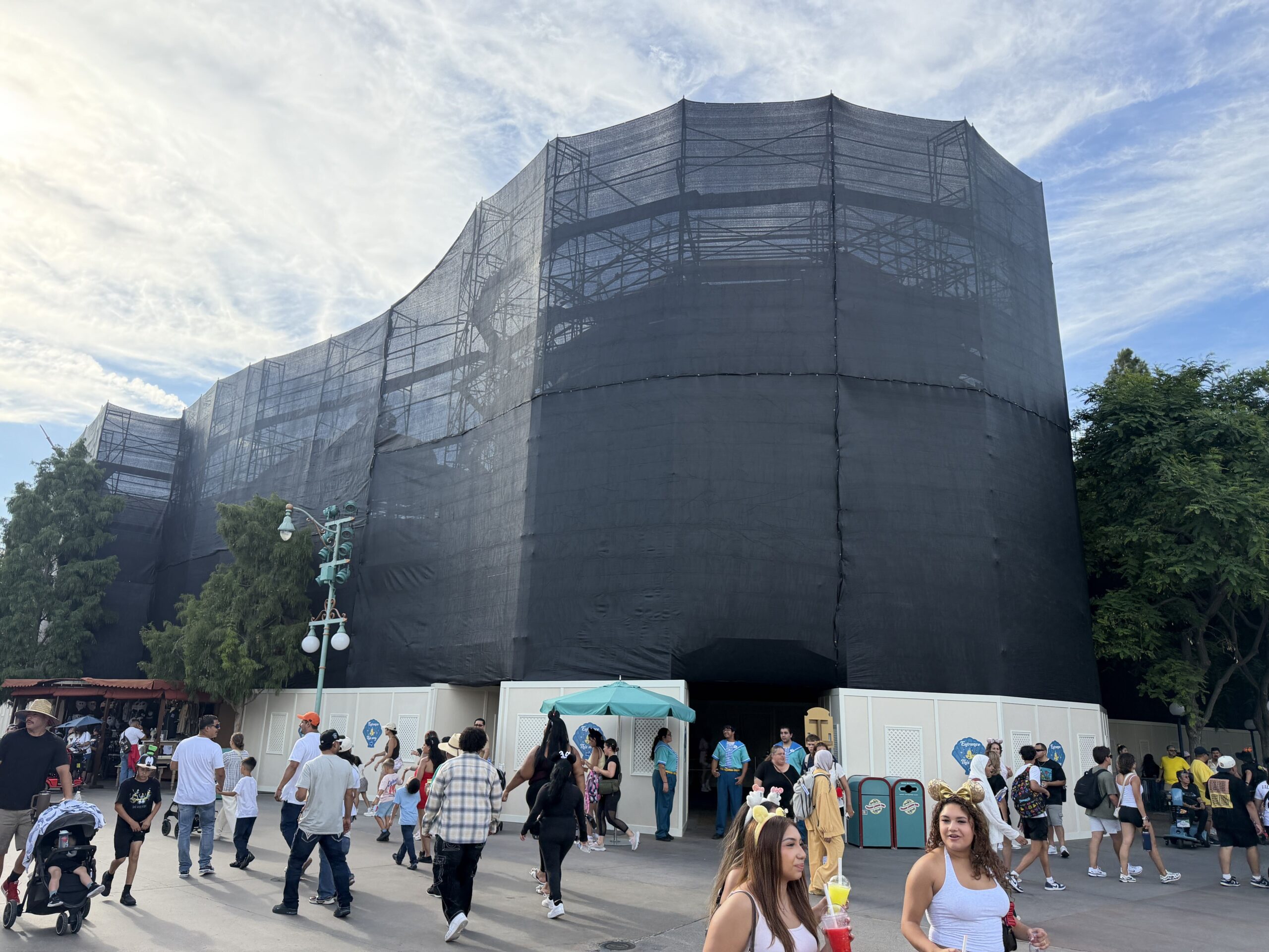 The Little Mermaid ~ Ariel’s Undersea Adventure at Disney California Adventure is completely surrounded by construction walls, scaffolding, and black scrims.