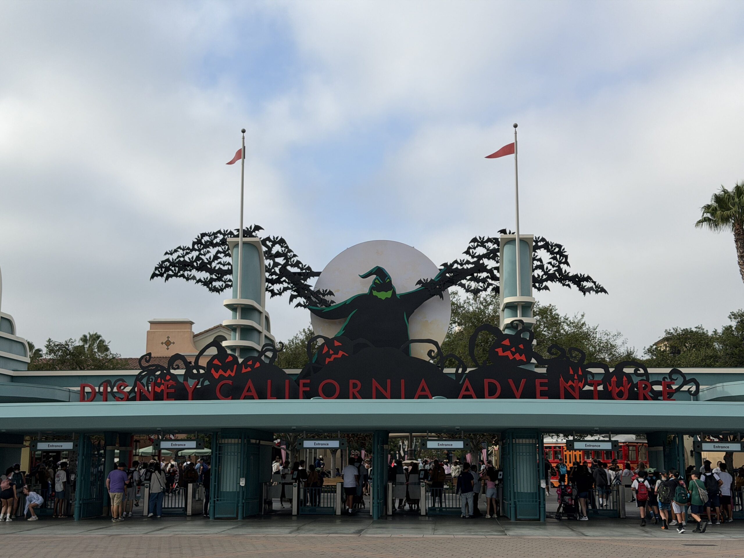 The Oogie Boogie Bash entrance decoration has been installed above the Disney California Adventure gates. We also noticed more decor in the park.
