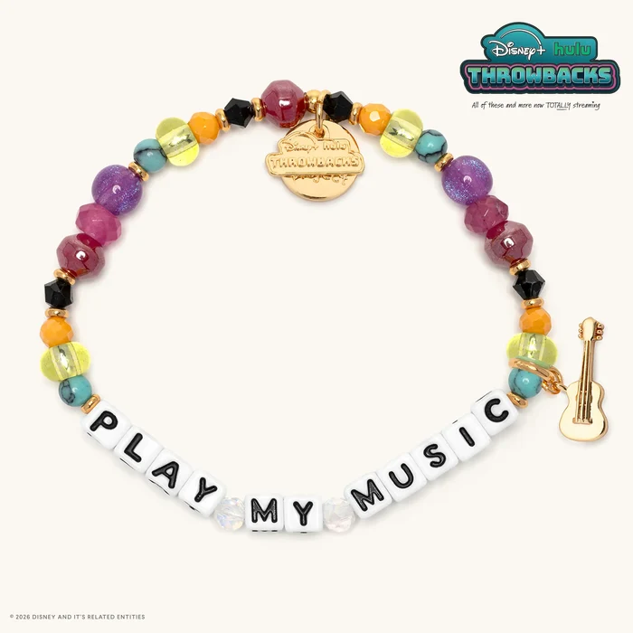 This bracelet comes with a rainbow assortment of beads, and "PLAY MY MUSIC" is spelled out with white letter blocks. A gold guitar charm is included as well.