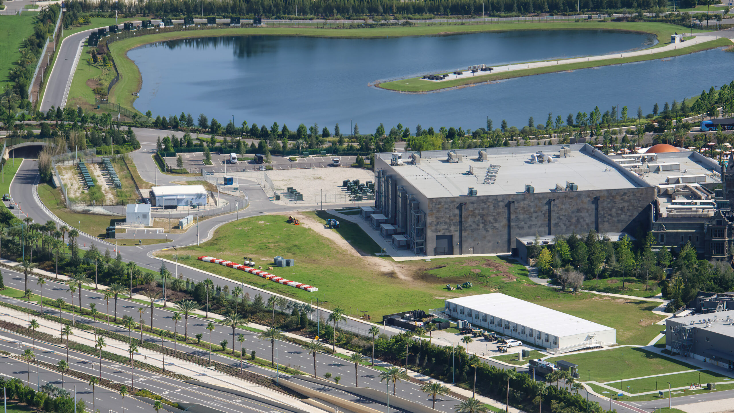 The cleared site is in the top left corner of the above photo, next to the Monsters Unchained show building. Dirt paths show where the tall trees used to be. They filled out the "forest" of Dark Universe.