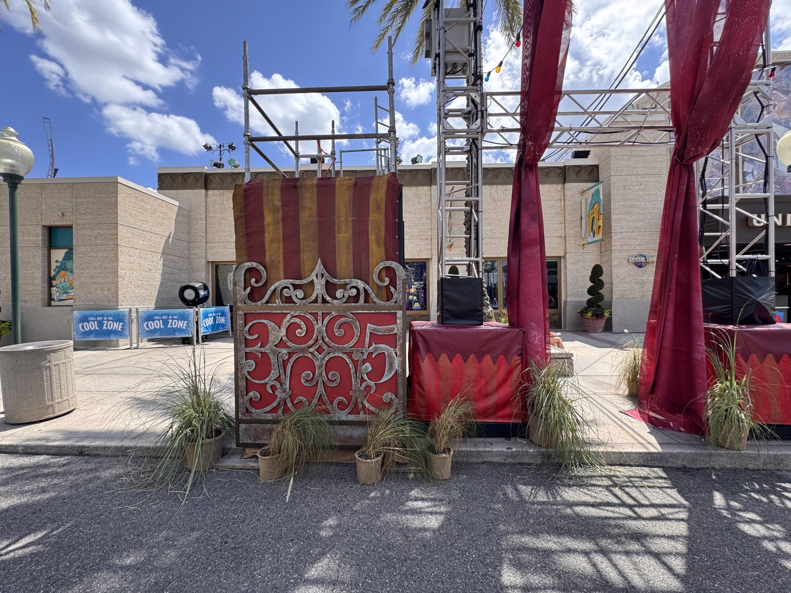 Jack the Clown and Dr. Oddfellow will presumably stand on these platforms in front of the trusses. The platform on the right has a purple and blue color scheme corresponding to Oddfellow while the yellow and red colors of the other platform match Jack. Both have "35," the event number, hidden in their faux iron bases.