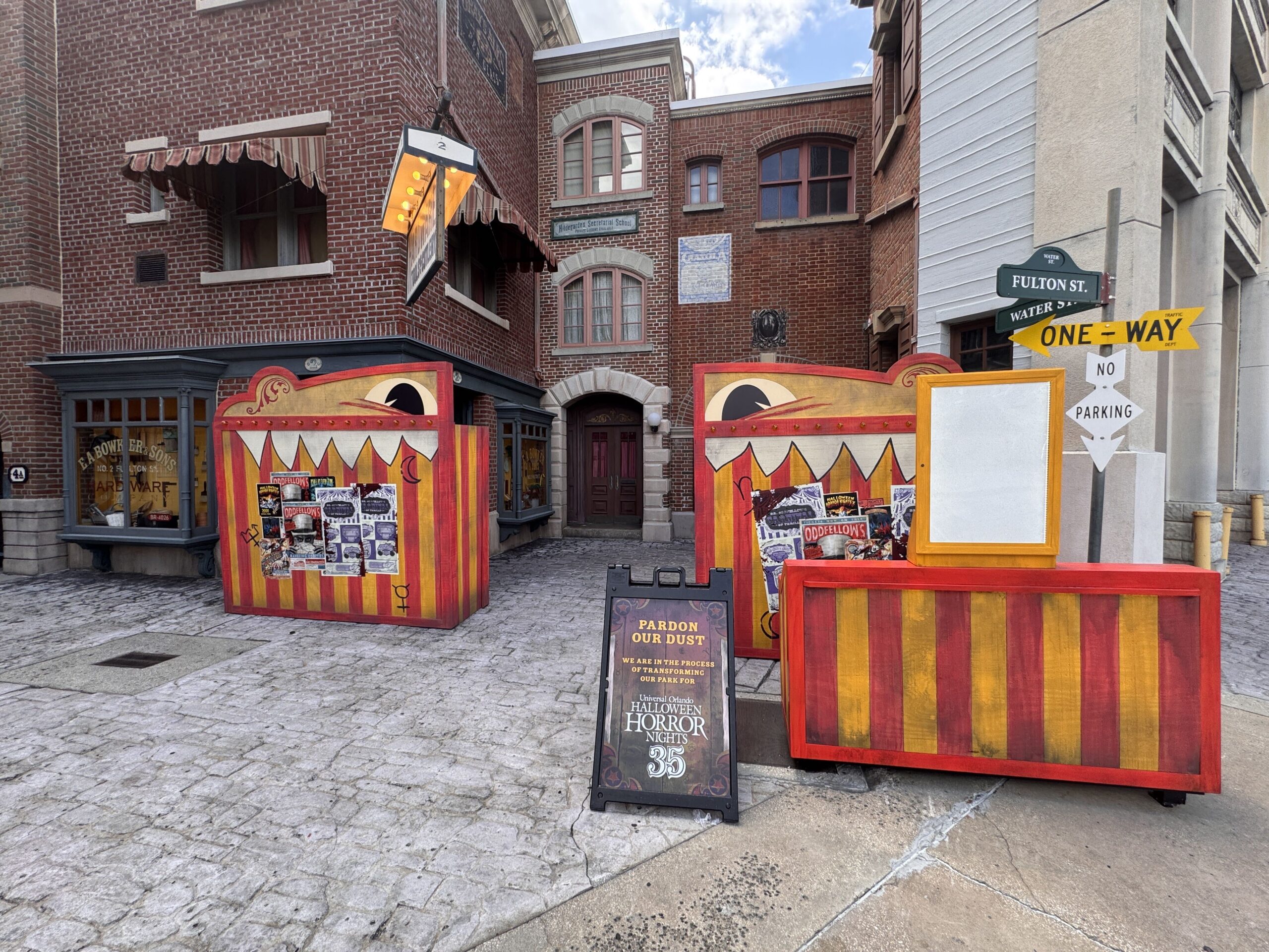 At one end are red and yellow-striped walls plastered with thematic posters, where guests will enter the alley to retrieve their food.