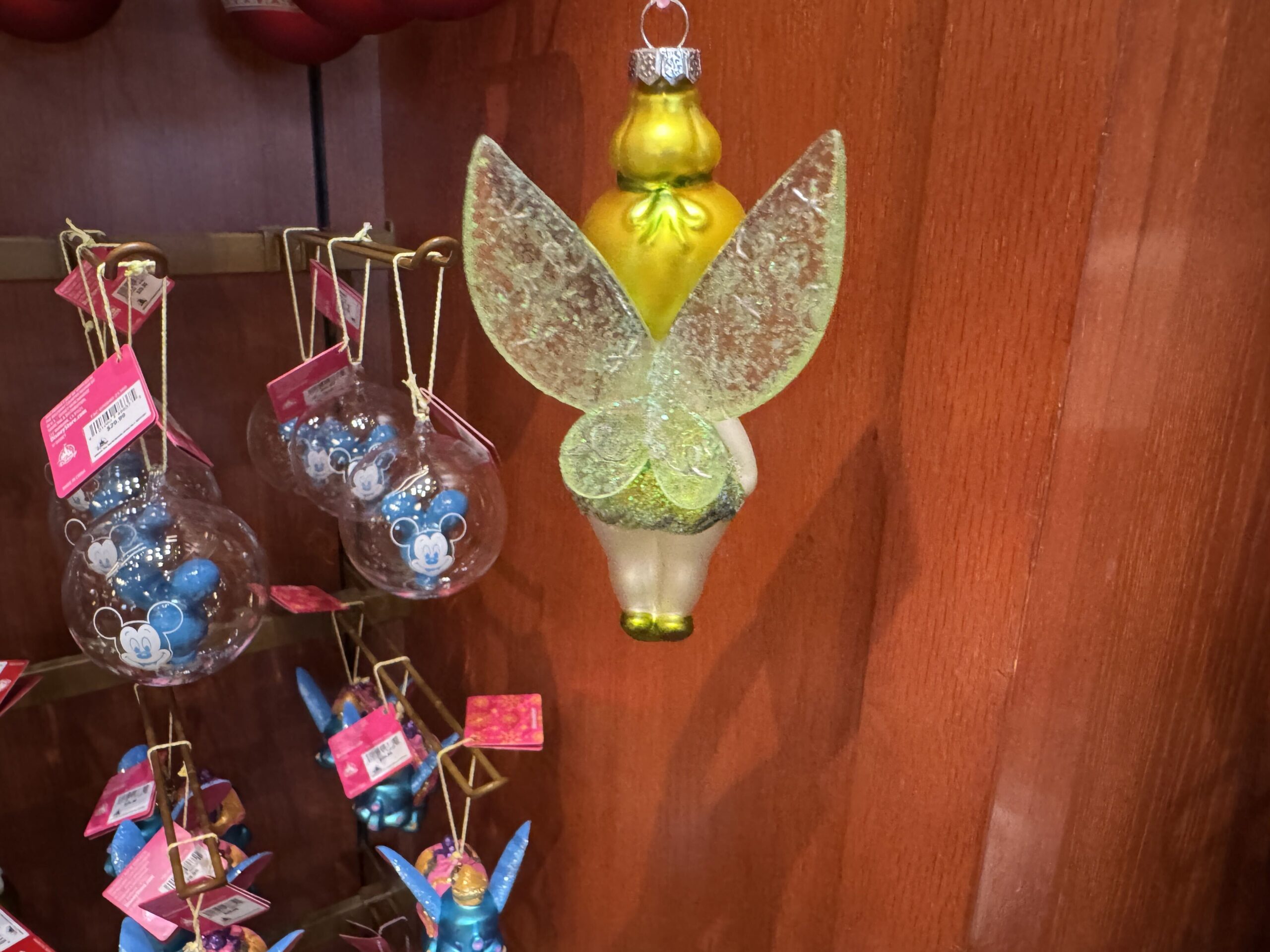 Her wings are made of frosted glass, textured with her pixie dust sparkles. 
