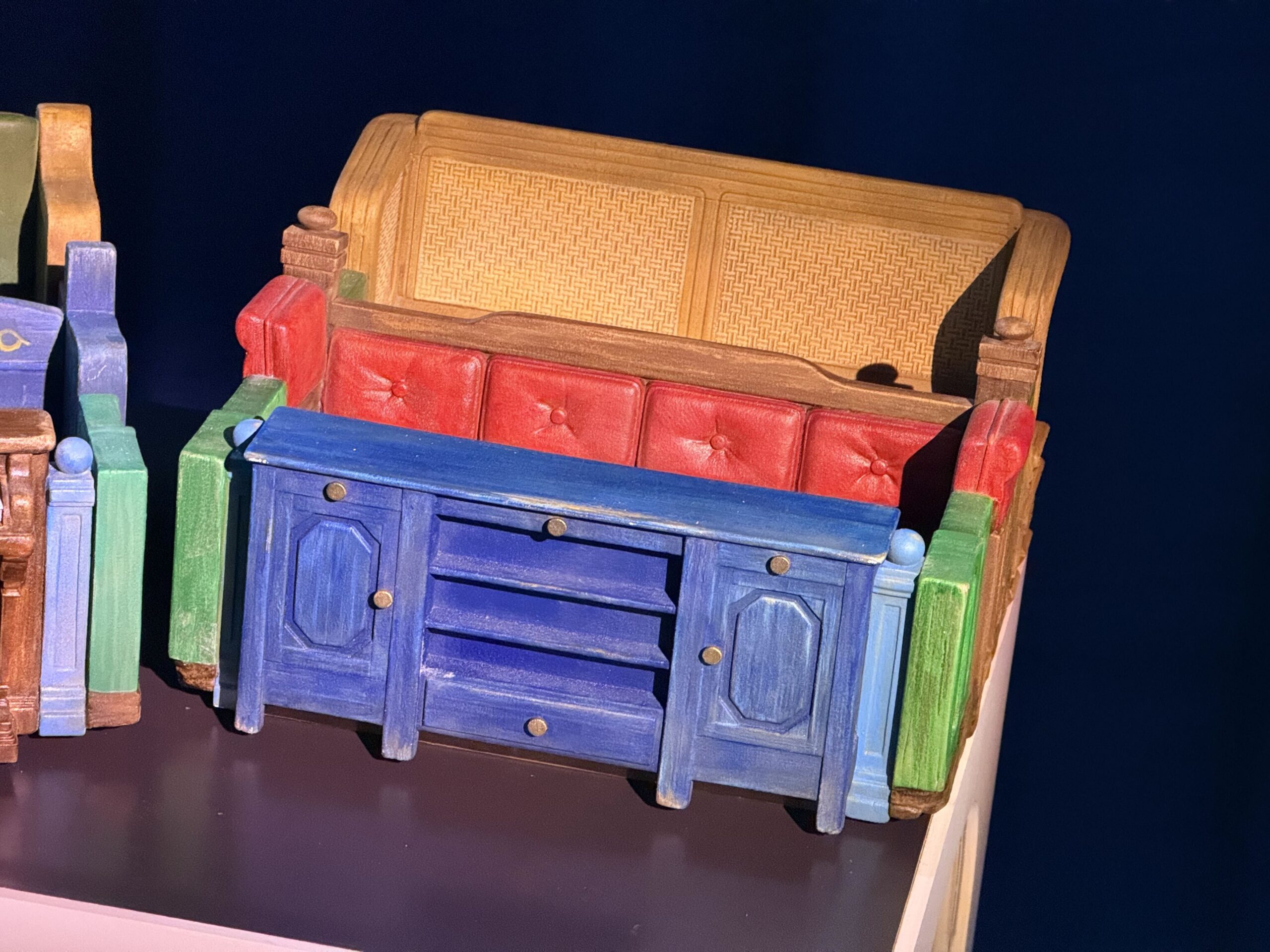 At D23: The Ultimate Disney Fan Event, Walt Disney Imagineering shared a model of the Encanto ride coming to Disney's Animal Kingdom, revealing a scene guests will experience. There are also models of the ride vehicles and animatronics.