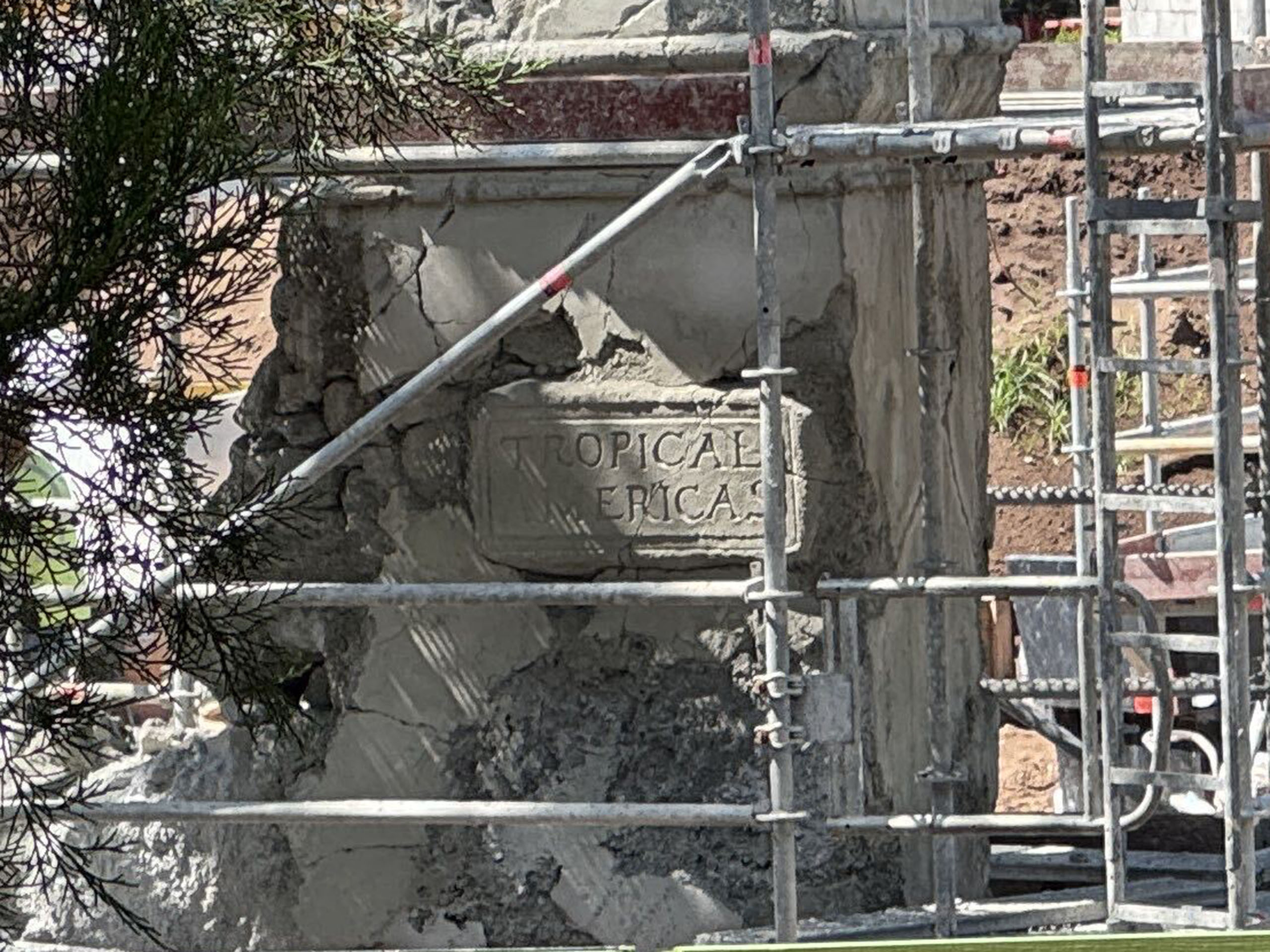 A carved "Tropical Americas" marquee sign is now visible on one of the entrance columns at Disney's Animal Kingdom.