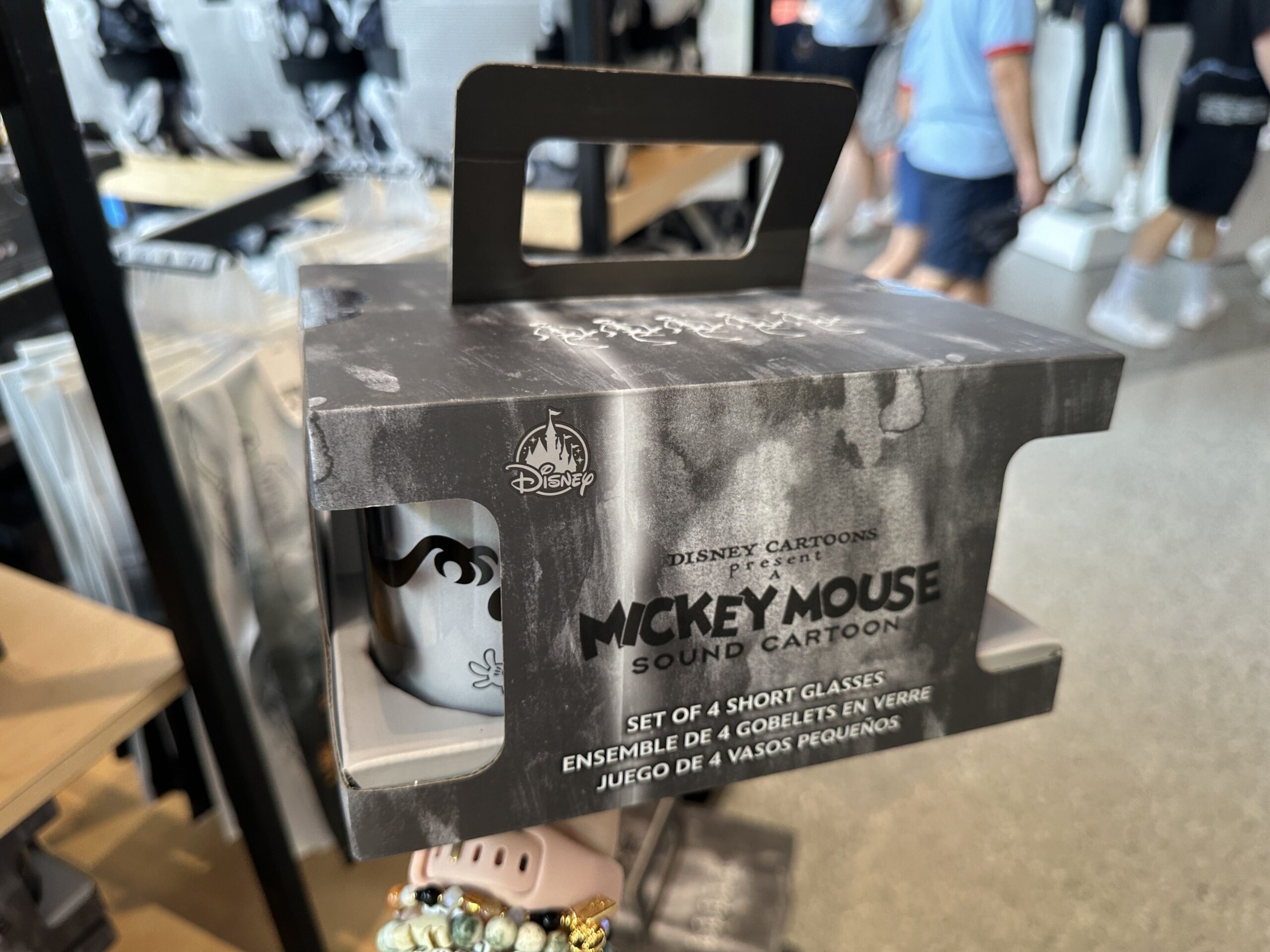 Four different scenes from "The Skeleton Dance" are depicted on these four short glasses. One is of the skeletons dancing, another of a ghost sneaking up on Mickey, the third of the skeleton horde scaring Mickey and the fourth of black cats and a skeleton in a cemetery.