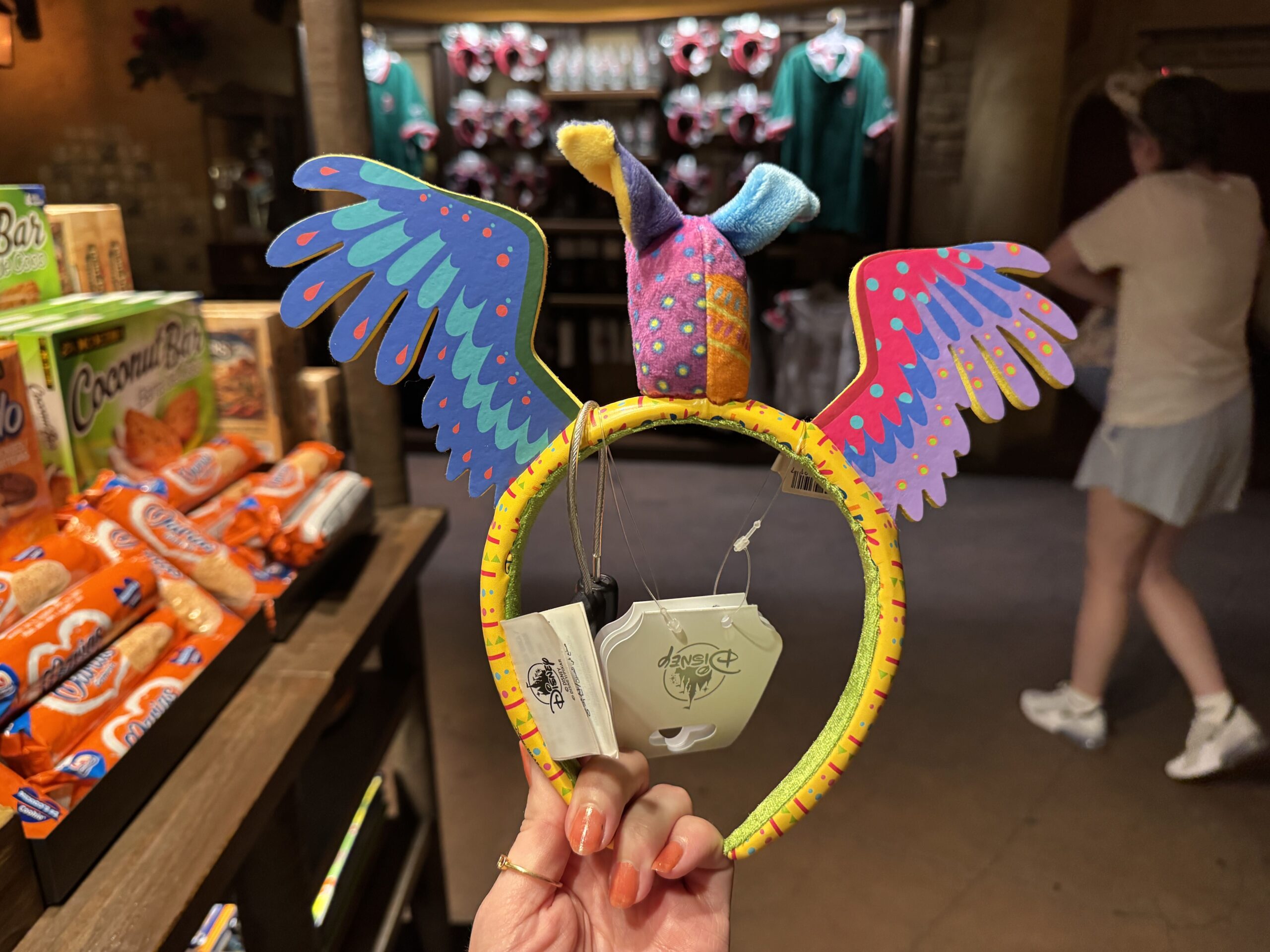 A new colorful Dante Alebrije ear headband has arrived at the Mexico Pavilion in EPCOT.