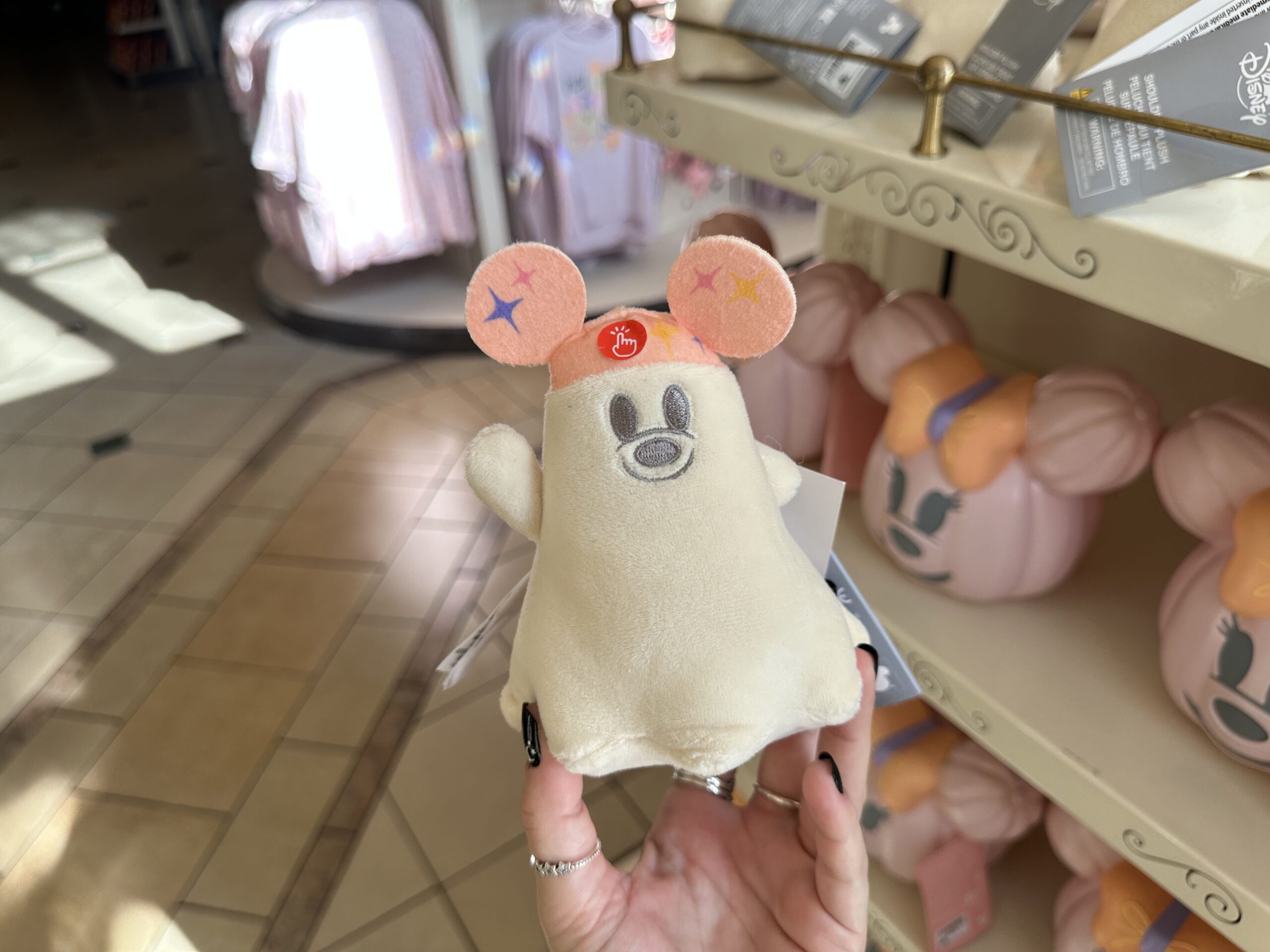 The Mickey ghost shoulder plush has embroidered features an an orange ear hat.