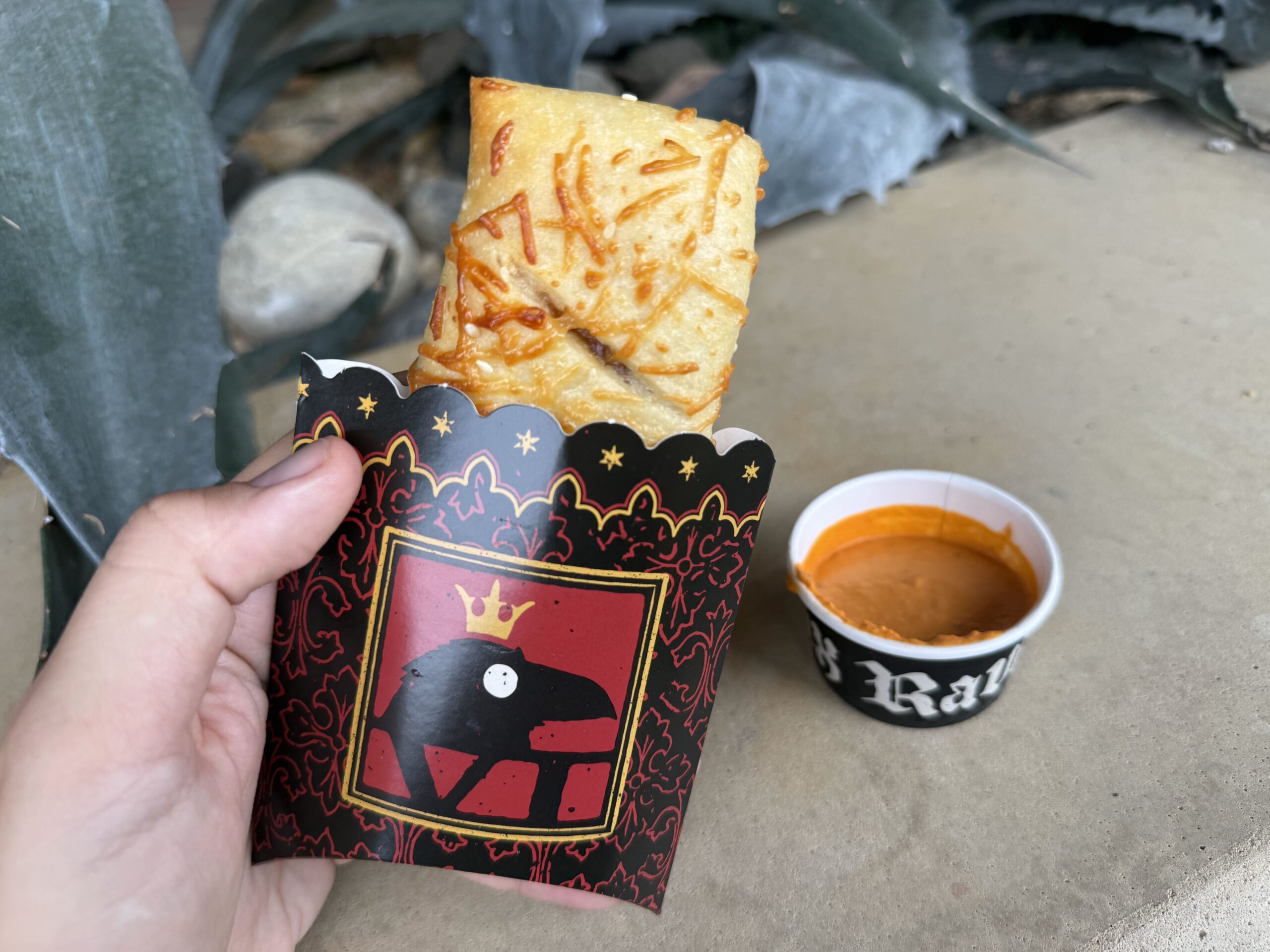 Middle Ages Grilled Cheese using Vermont White Cheddar, Havarti cheese, and House Tomato Jam wrapped in a Parmesan smothered Coffyn. Pairing: Wolf Peach Sauce