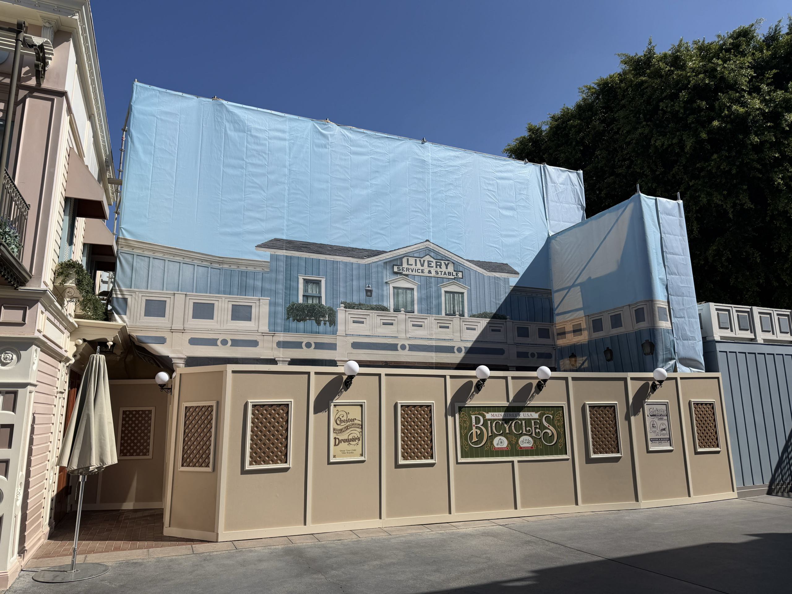 Themed construction walls and scrim are now up at the character meet location next to Disney Showcase on Main Street, U.S.A. at Disneyland.