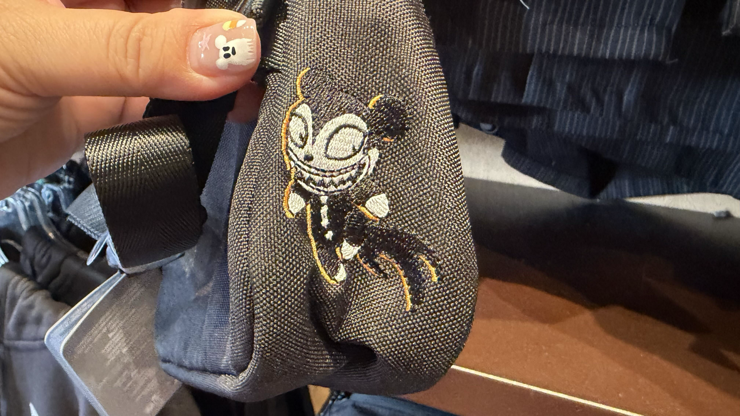 New character belt bags have arrived at Disney World, including a spooky The Nightmare Before Christmas style and a floral Daisy Duck design.